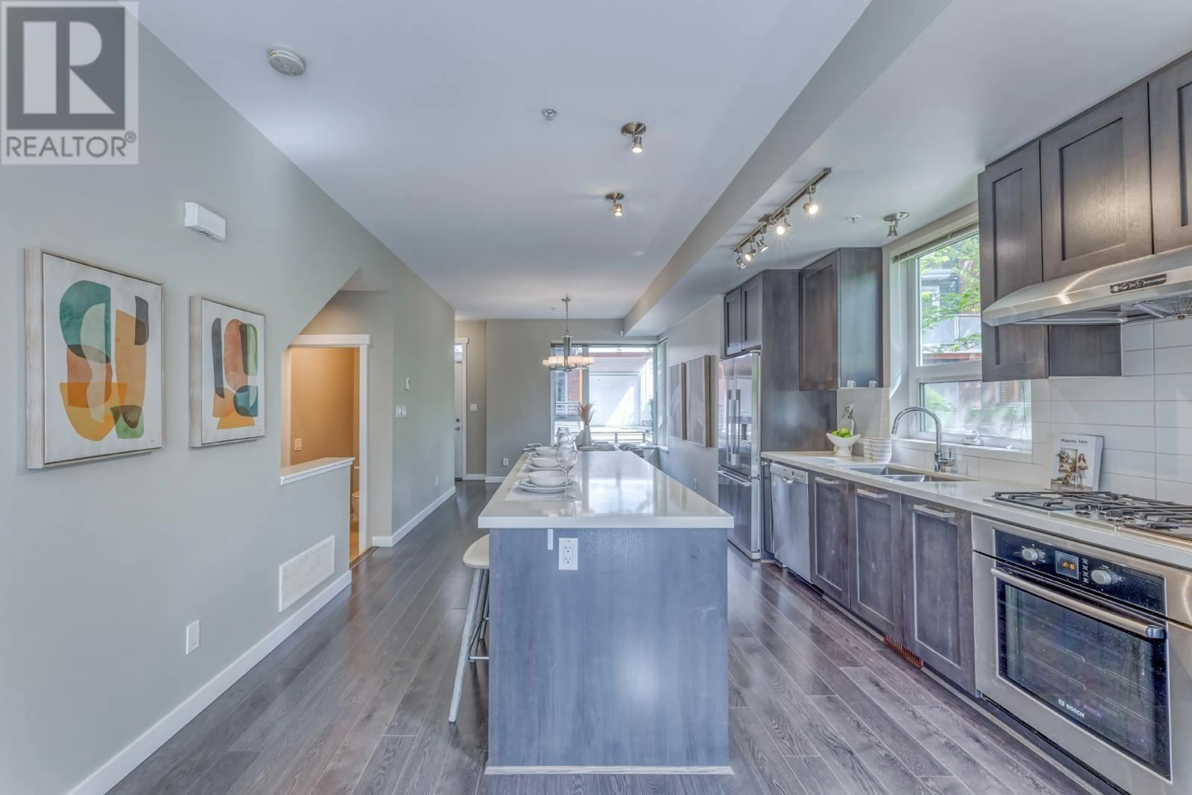 Open concept kitchen, ceramic/tile floor for 3137 SONGBIRD MEWS, Vancouver British Columbia V5S0B1