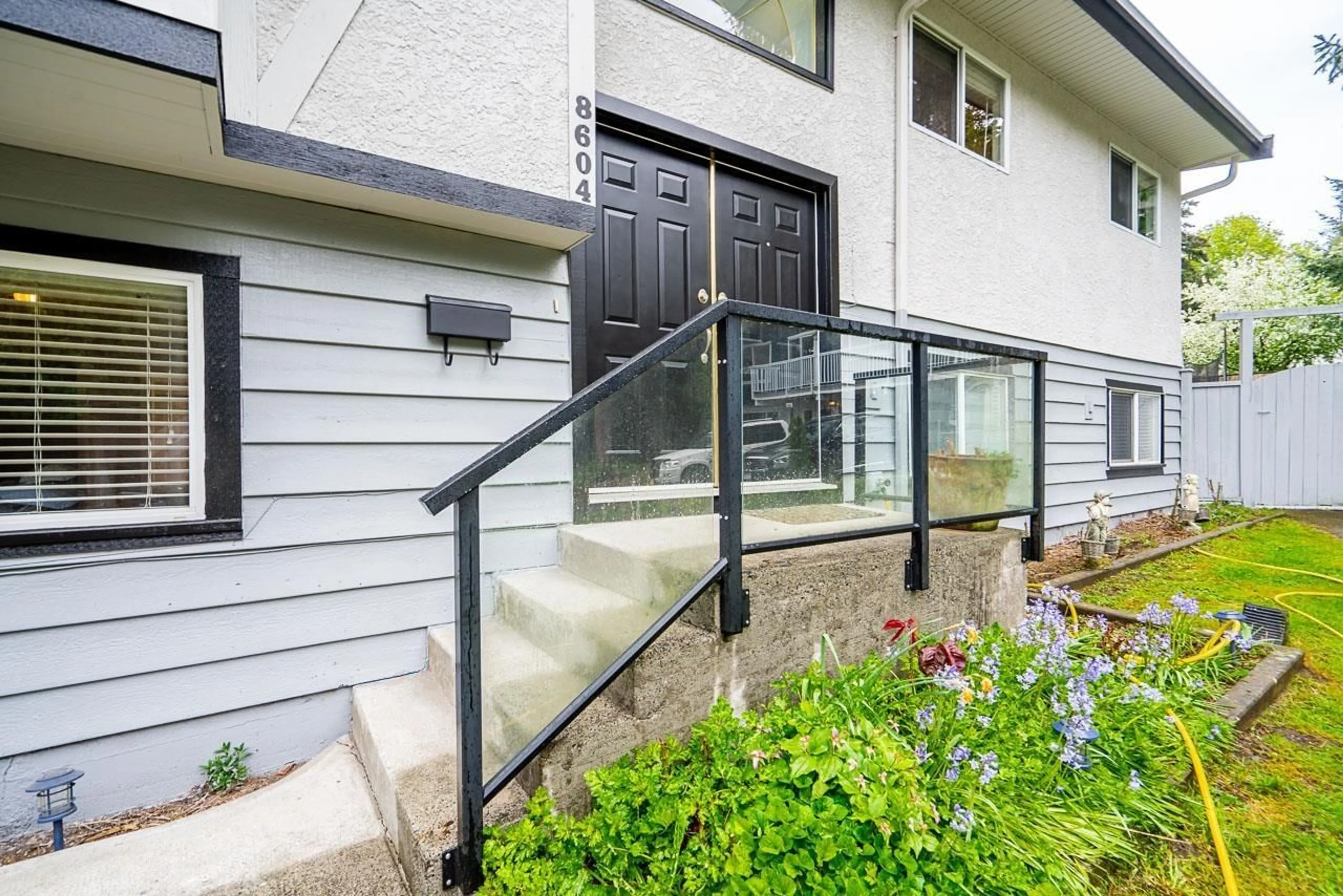Home with vinyl exterior material, street for 8604 SUNBURY, Delta British Columbia V4C3Y7
