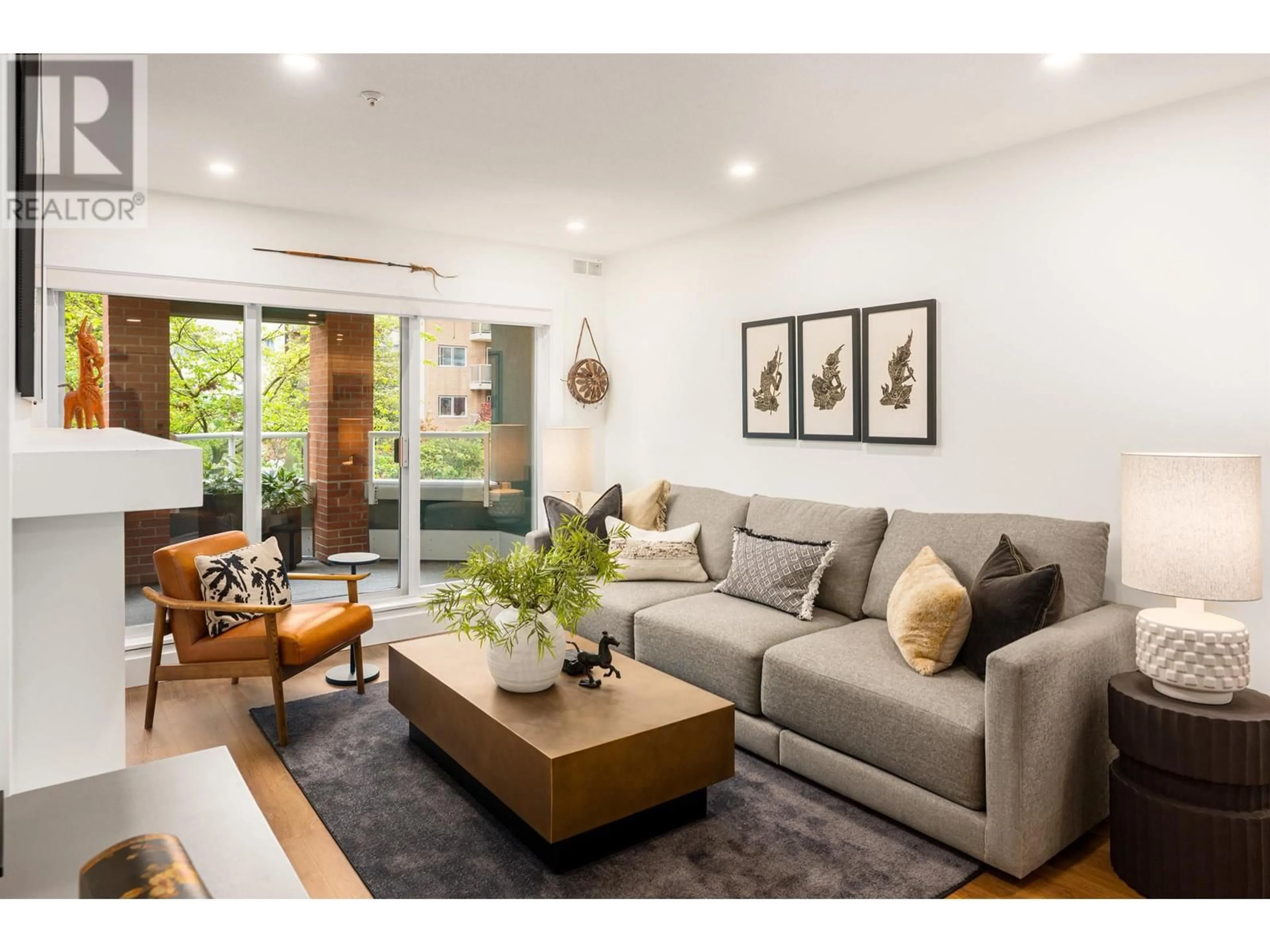 Living room with furniture, unknown for 208 - 128 8TH STREET, North Vancouver British Columbia V7M3M1