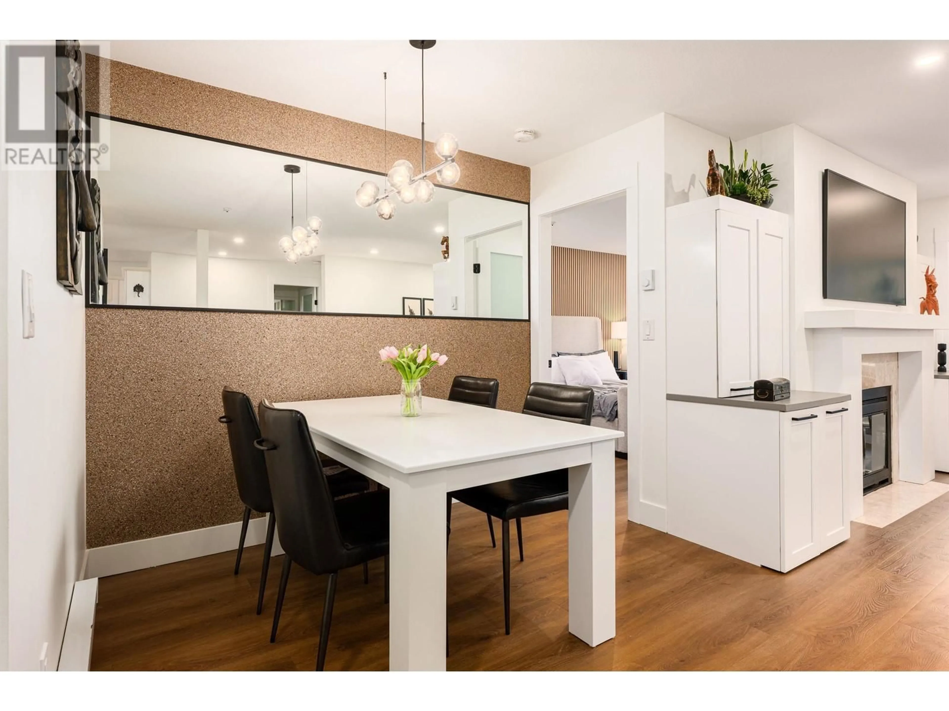 Contemporary kitchen, wood/laminate floor for 208 - 128 8TH STREET, North Vancouver British Columbia V7M3M1