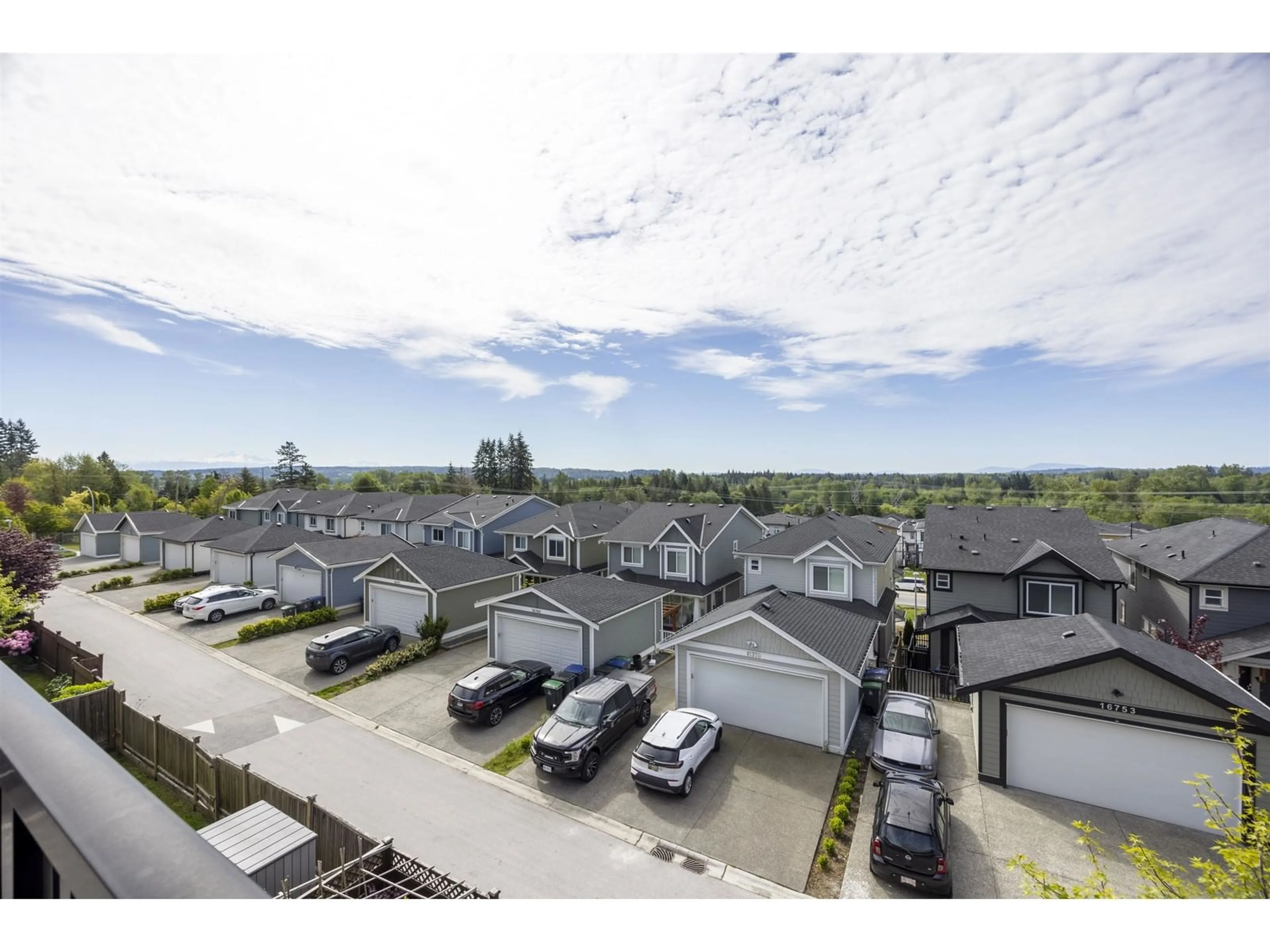 A pic from outside/outdoor area/front of a property/back of a property/a pic from drone, mountain view for 16764 16A, Surrey British Columbia V3Z0T3