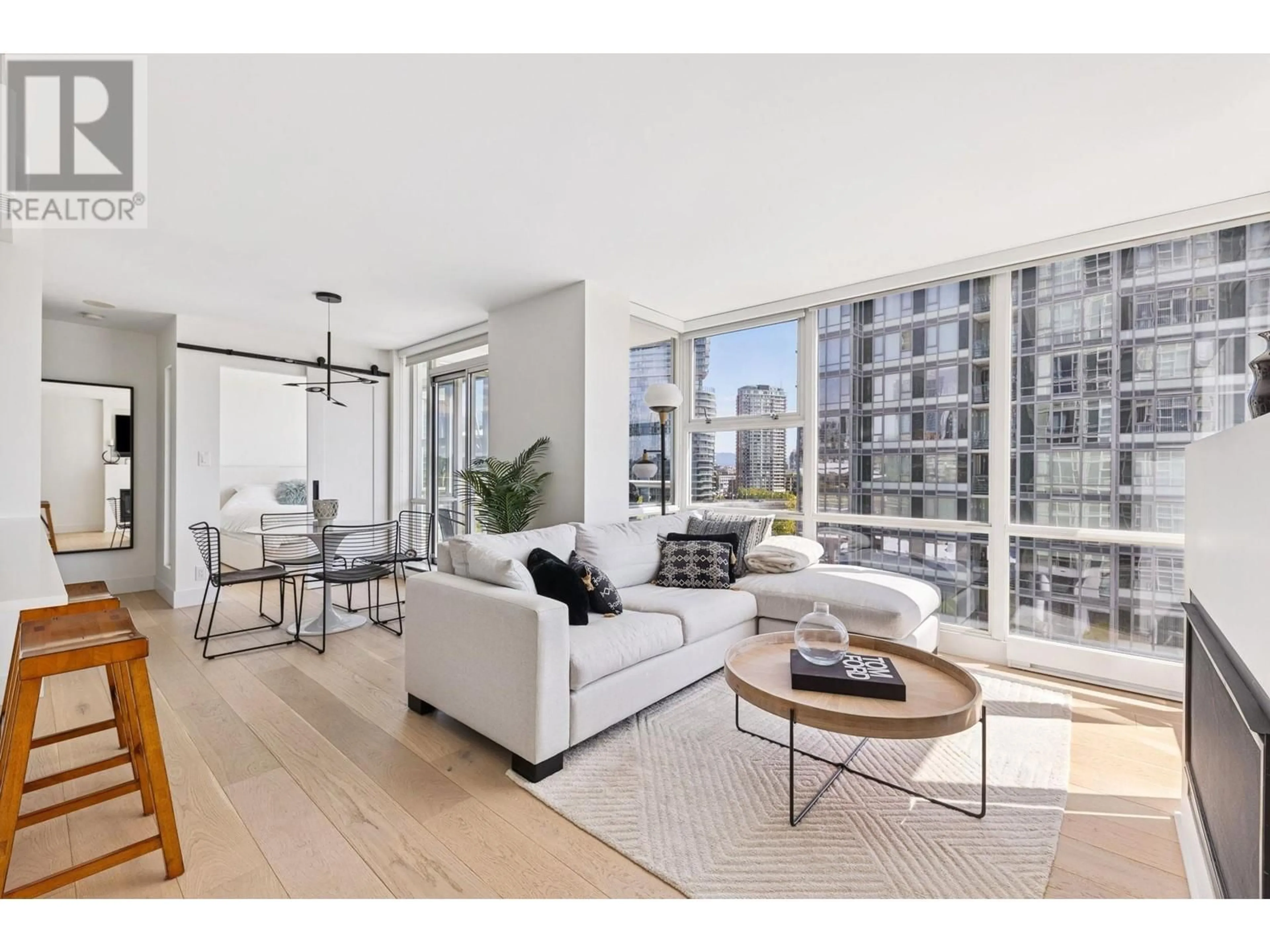 Living room with furniture, unknown for 801 - 1077 MARINASIDE CRESCENT, Vancouver British Columbia V6Z2Z5