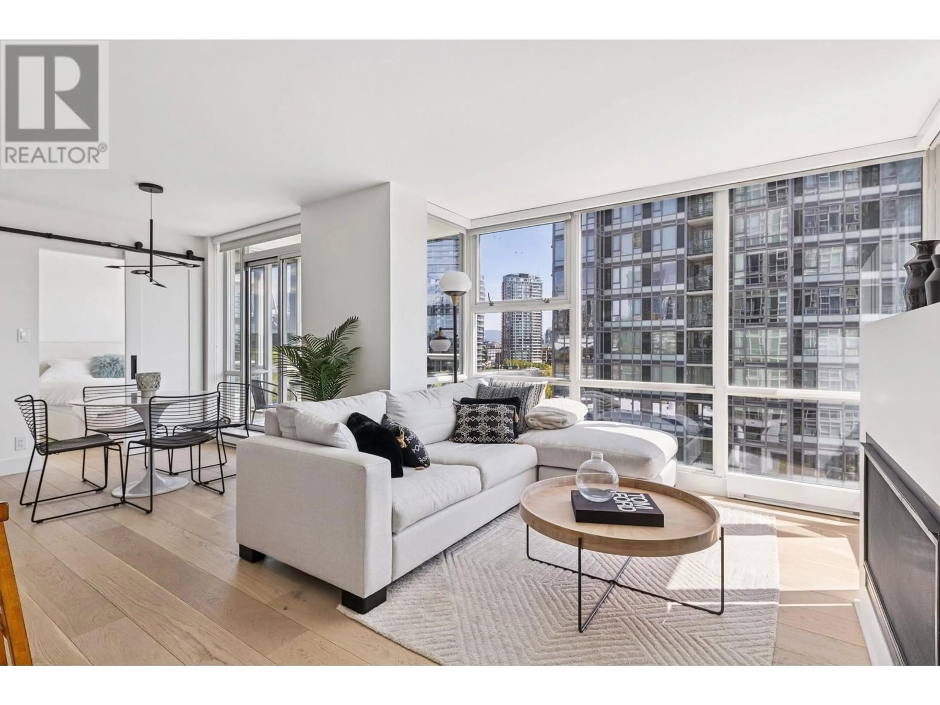 Living room with furniture, unknown for 801 - 1077 MARINASIDE CRESCENT, Vancouver British Columbia V6Z2Z5