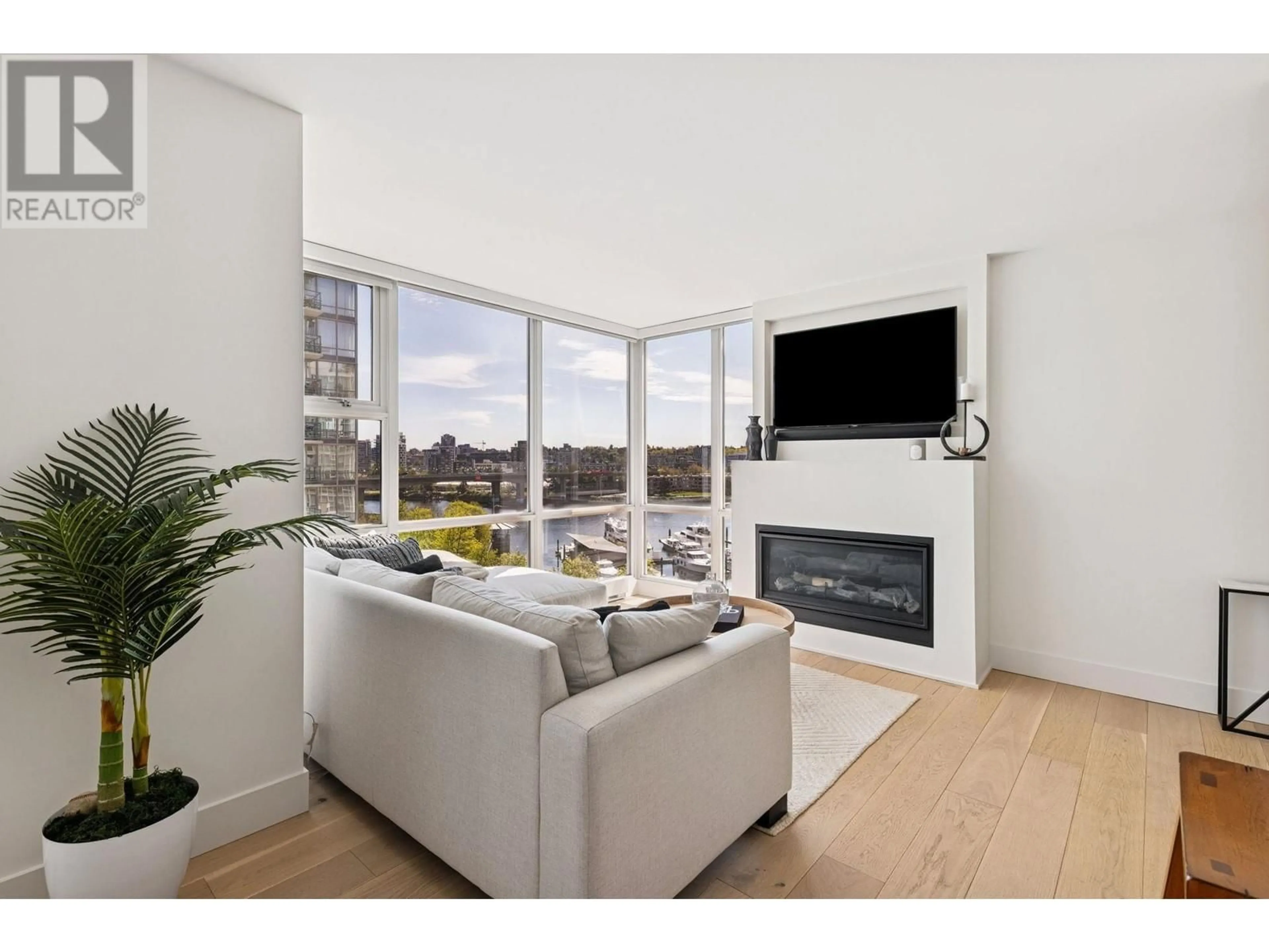 Living room with furniture, unknown for 801 - 1077 MARINASIDE CRESCENT, Vancouver British Columbia V6Z2Z5
