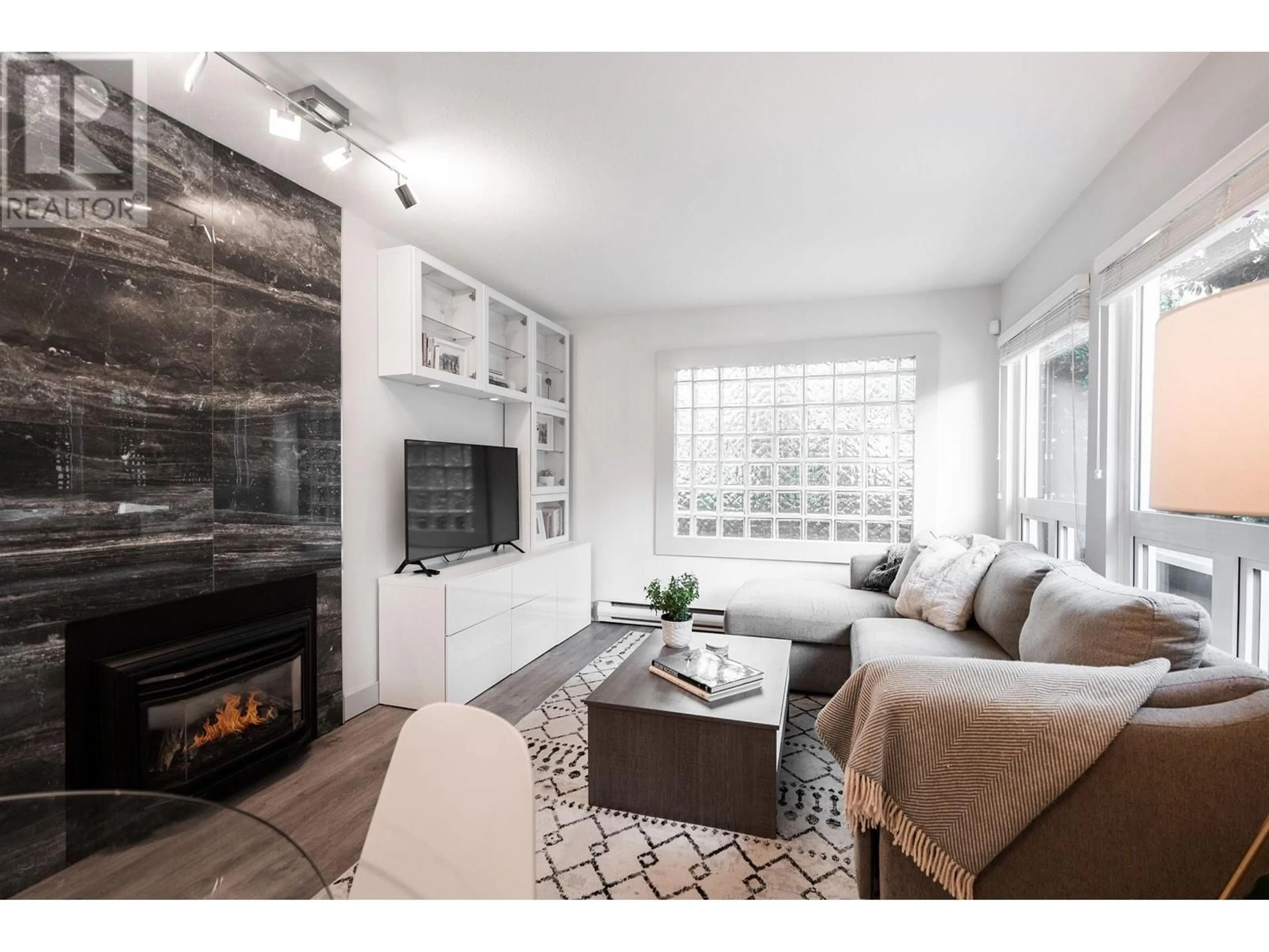 Living room with furniture, unknown for 203 - 1631 VINE STREET, Vancouver British Columbia V6K3J3