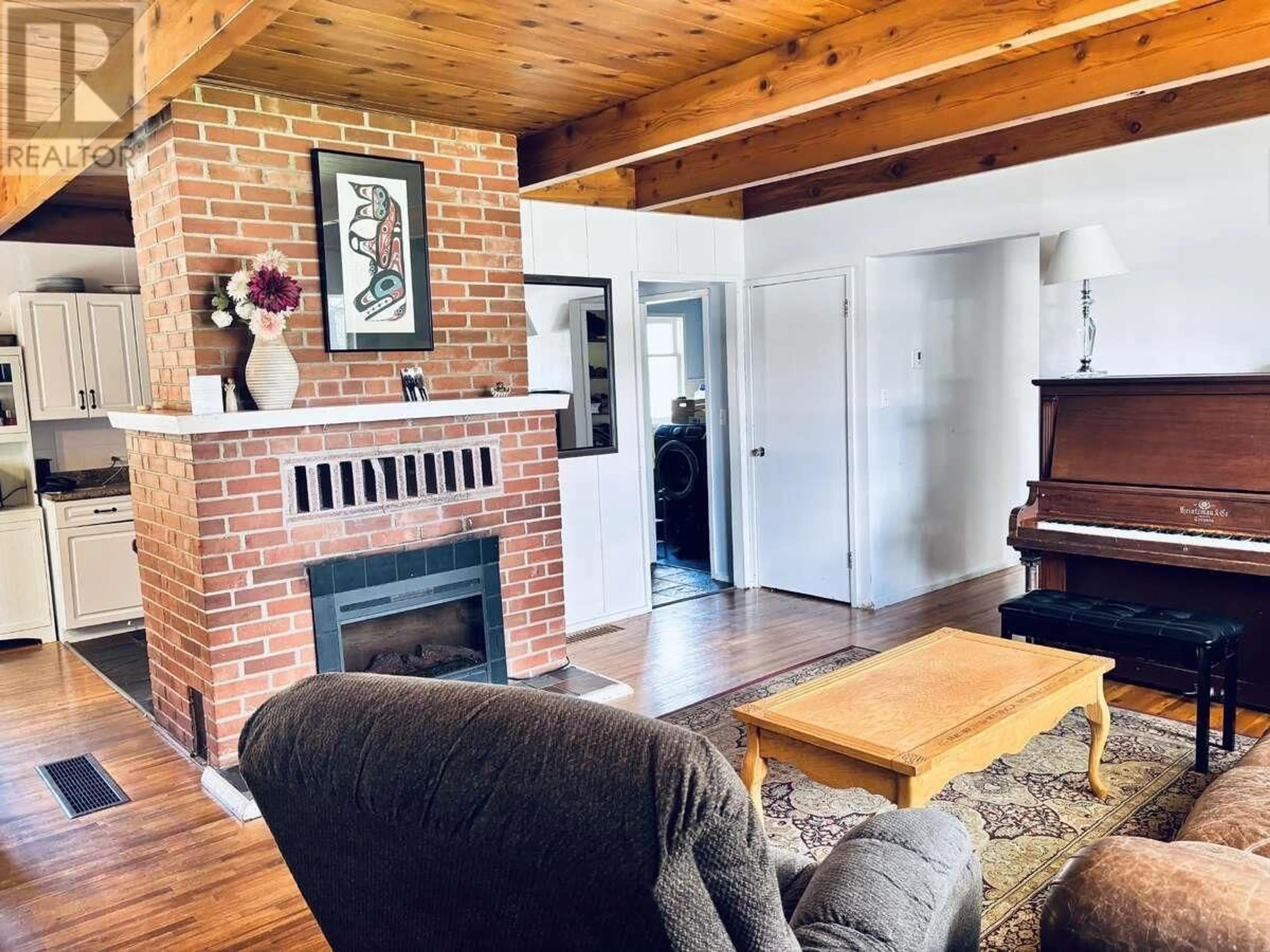 Living room with furniture, wood/laminate floor for 4920 AGAR AVENUE, Terrace British Columbia V8G1H7
