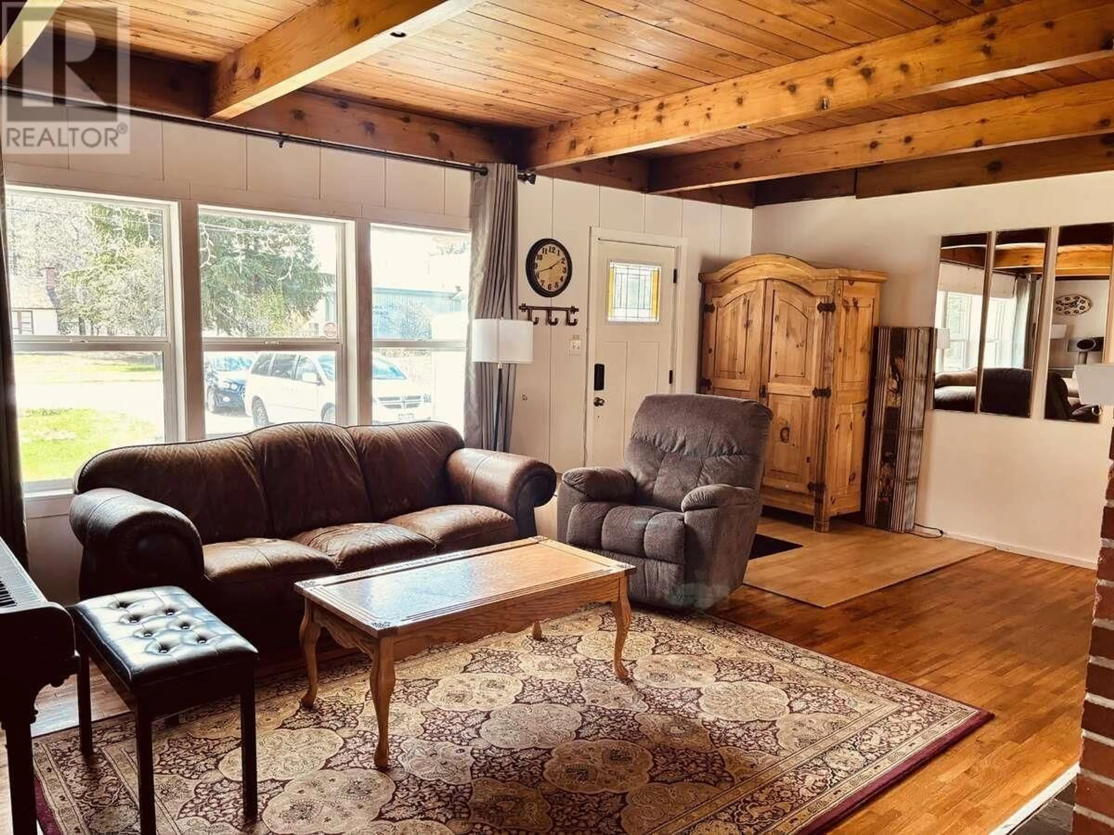 Living room with furniture, wood/laminate floor for 4920 AGAR AVENUE, Terrace British Columbia V8G1H7