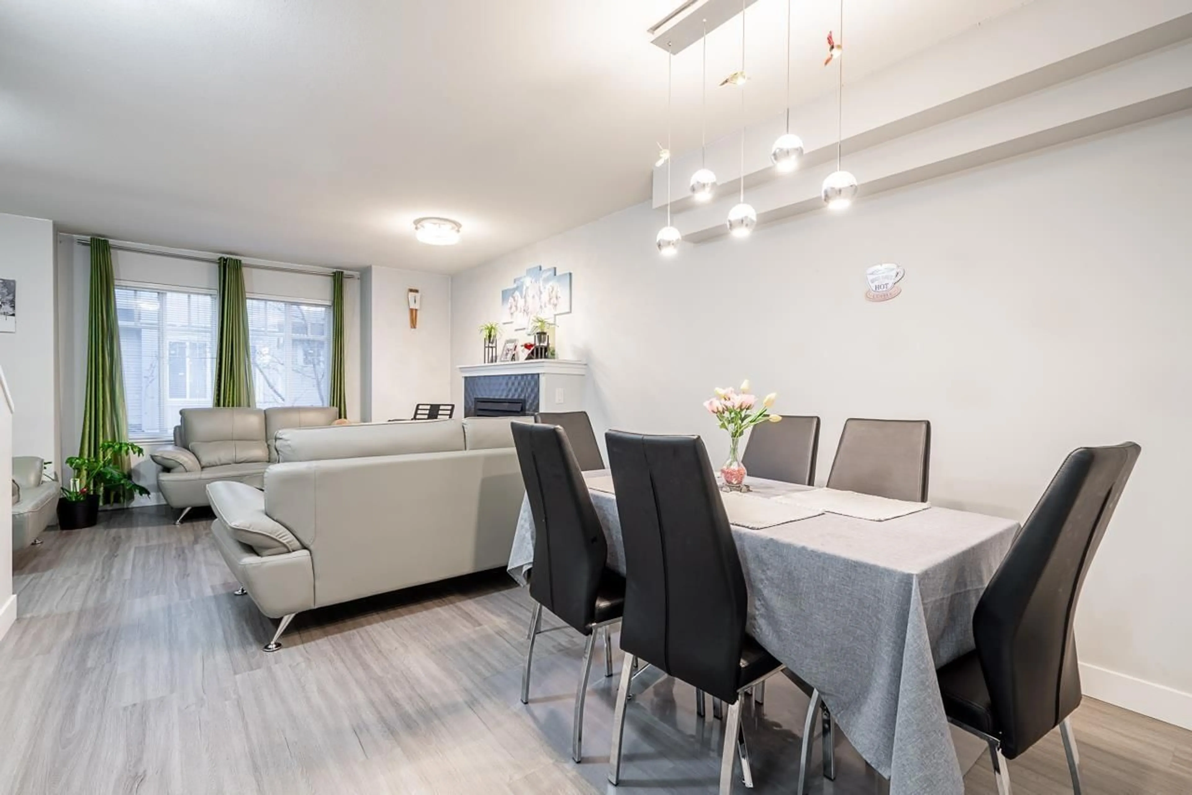 Dining room, wood/laminate floor for 118 - 12711 64, Surrey British Columbia V3W1X1