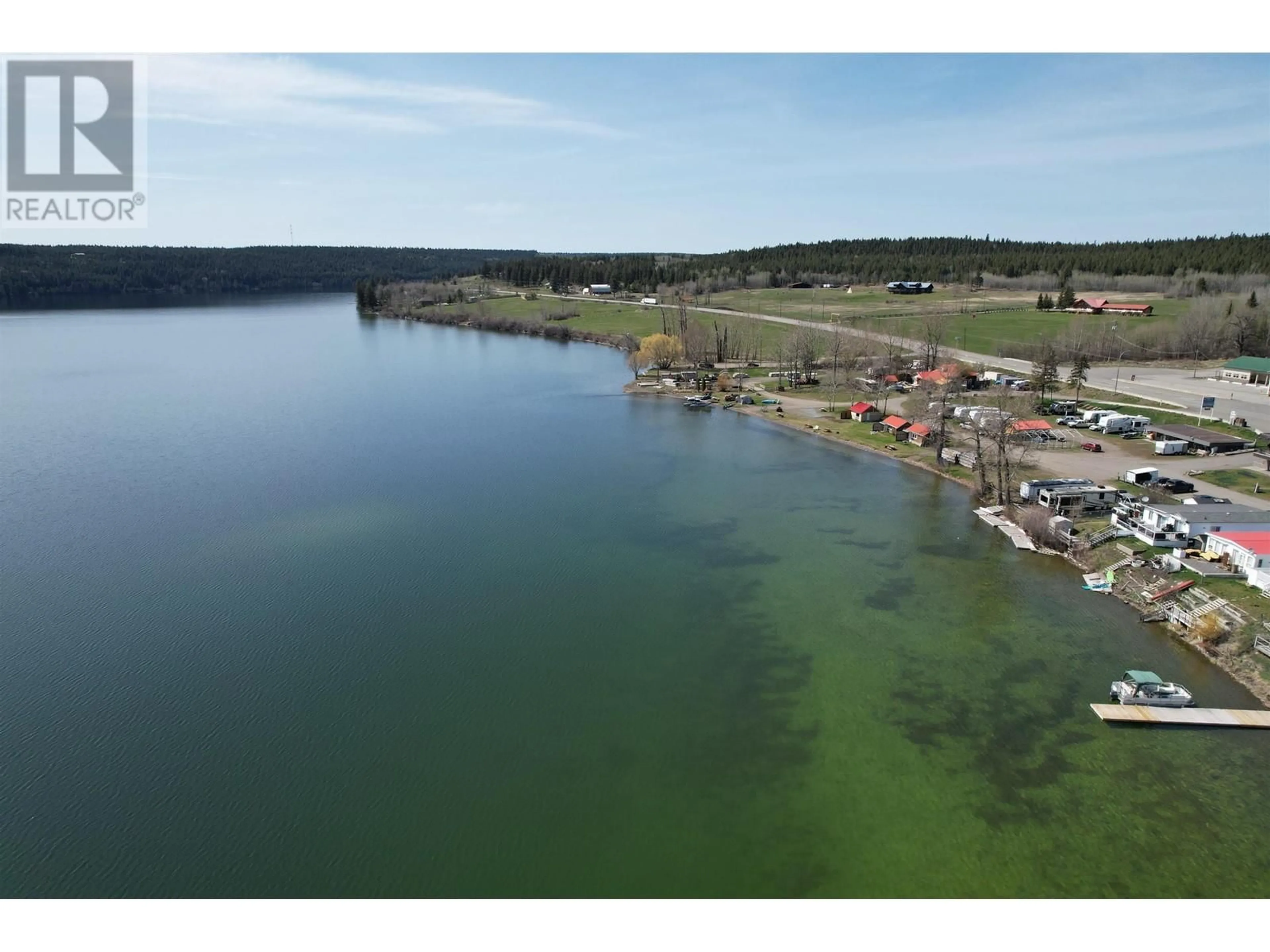 A pic from outside/outdoor area/front of a property/back of a property/a pic from drone, water/lake/river/ocean view for 20 - 3728 97 HIGHWAY, Lac La Hache British Columbia V0K1T0