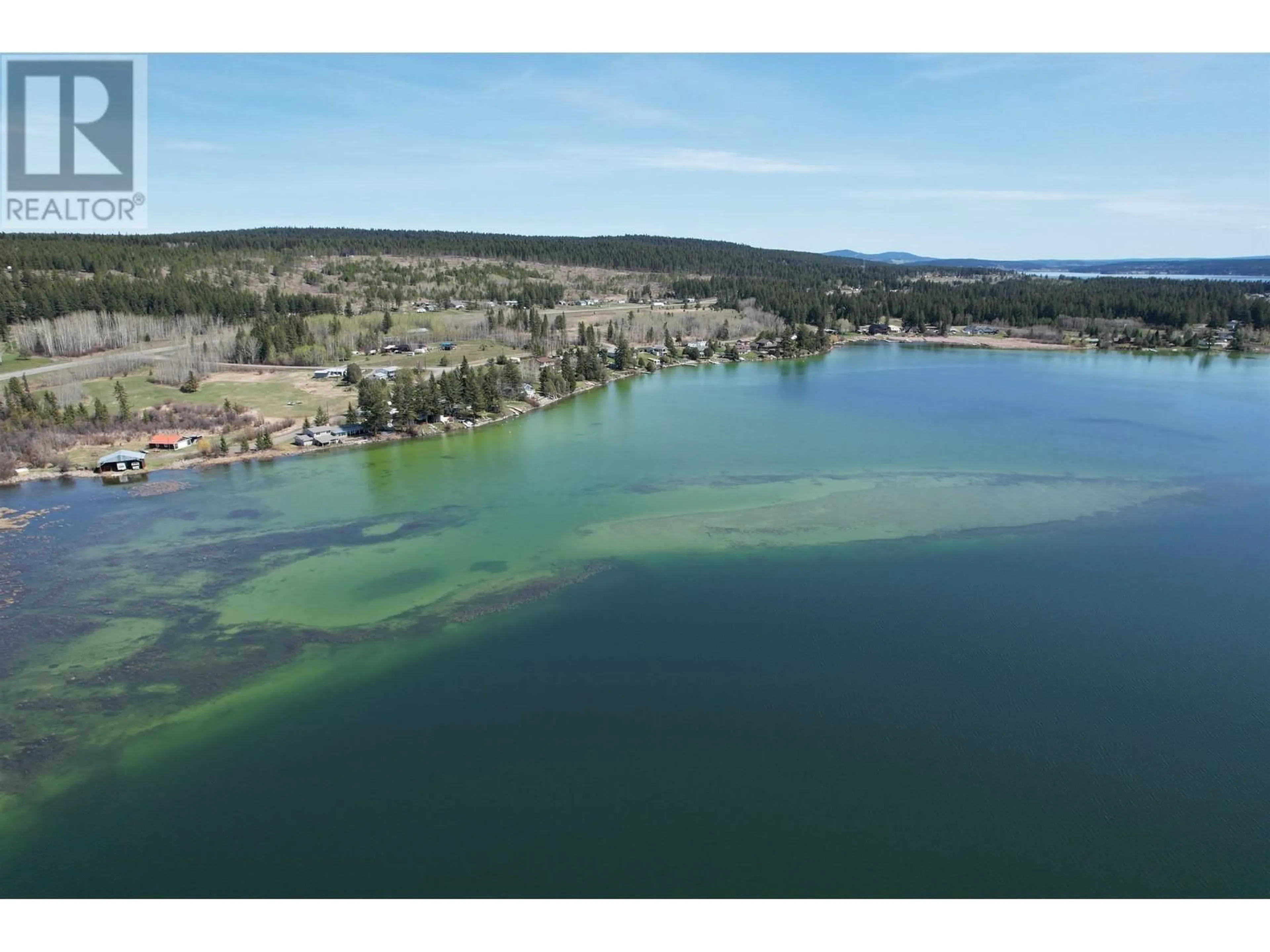 A pic from outside/outdoor area/front of a property/back of a property/a pic from drone, water/lake/river/ocean view for 20 - 3728 97 HIGHWAY, Lac La Hache British Columbia V0K1T0
