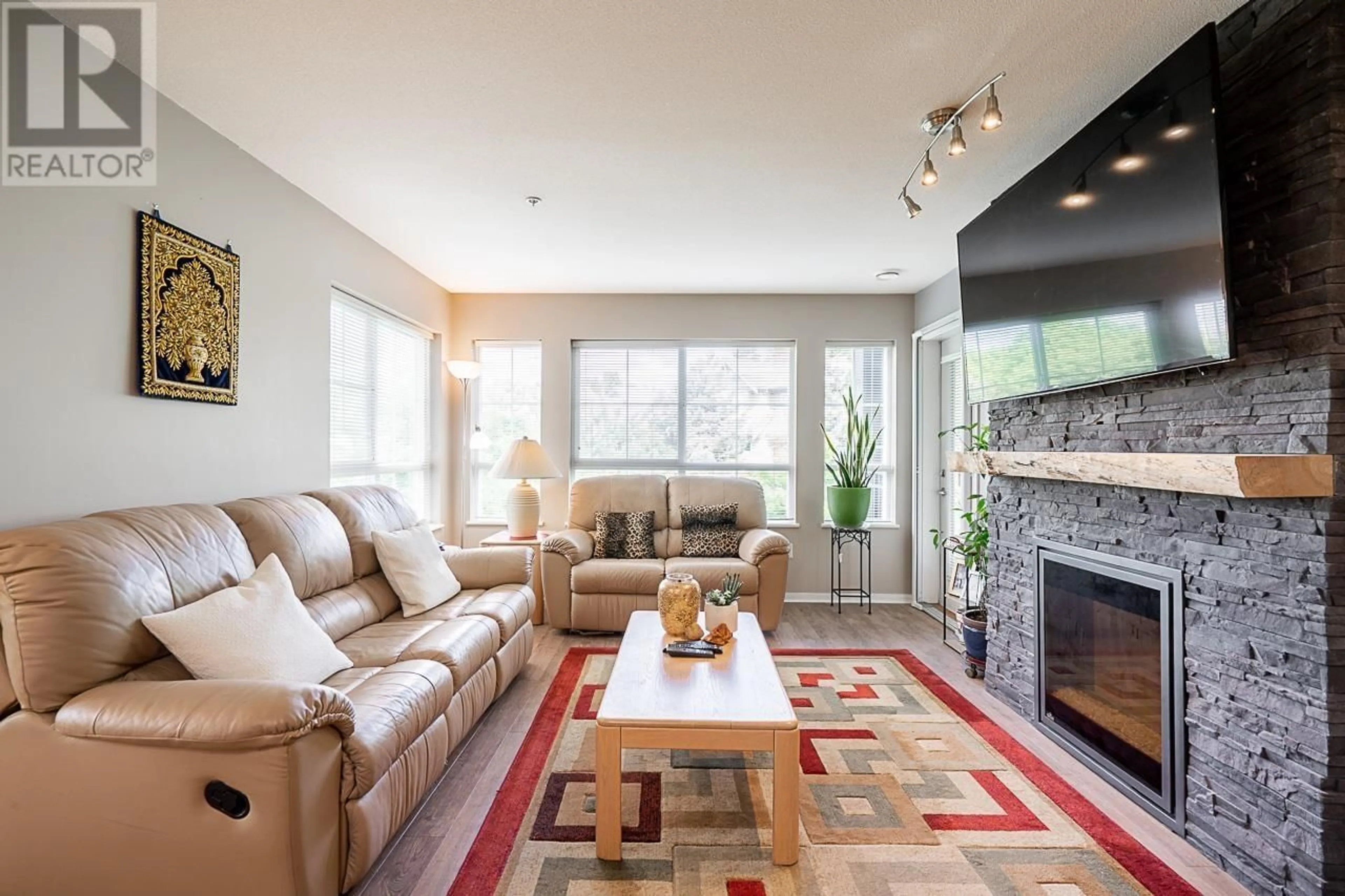 Living room with furniture, unknown for 317 - 9098 HALSTON COURT, Burnaby British Columbia V3N0A6