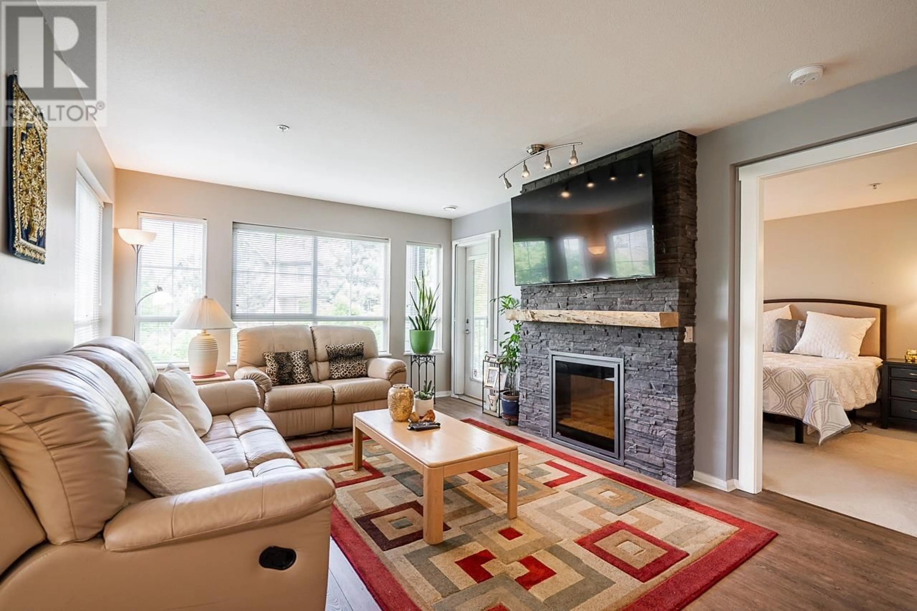 Living room with furniture, unknown for 317 - 9098 HALSTON COURT, Burnaby British Columbia V3N0A6