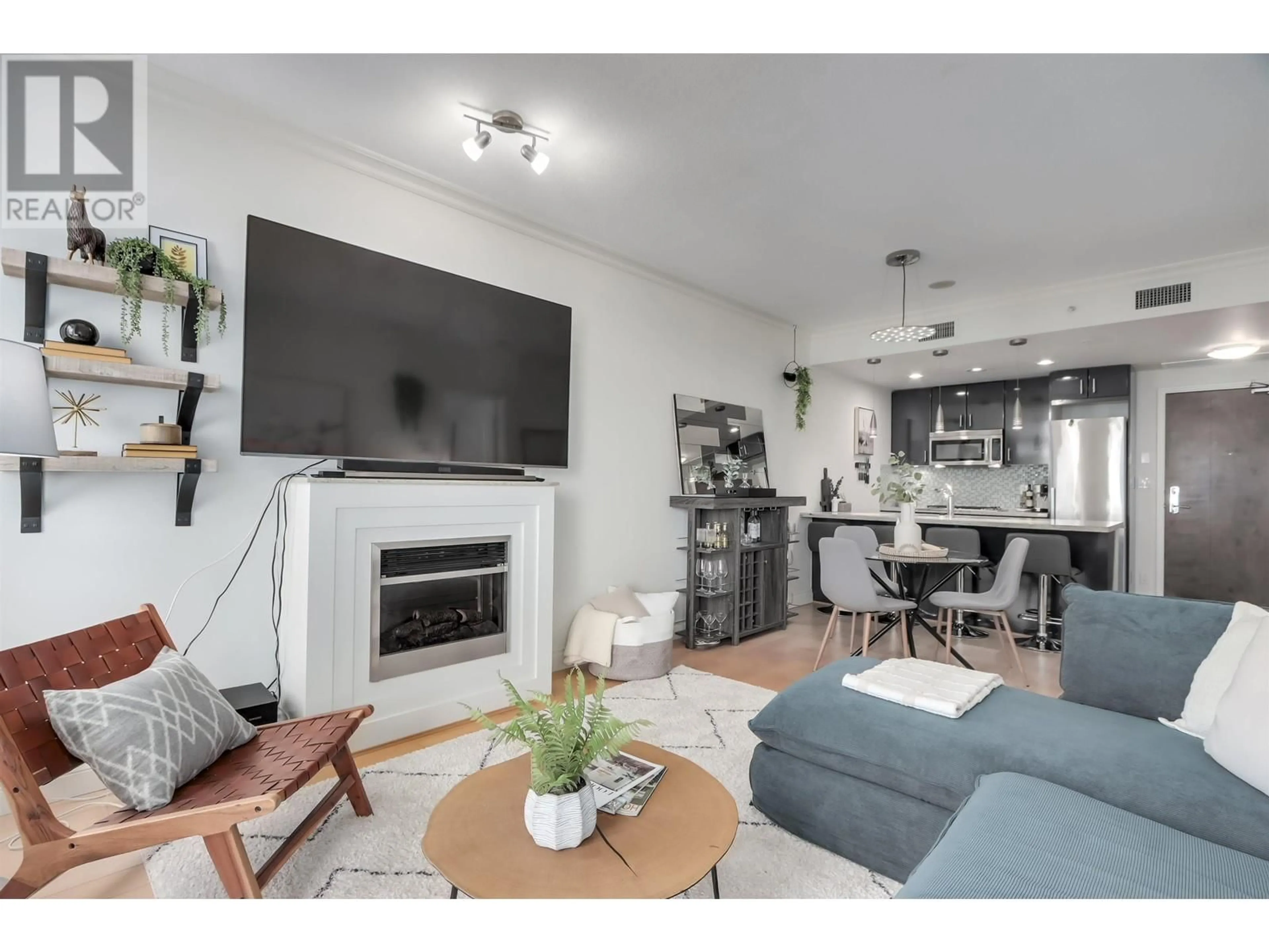 Living room with furniture, unknown for 903 - 162 VICTORY SHIP WAY, North Vancouver British Columbia V7L0B4