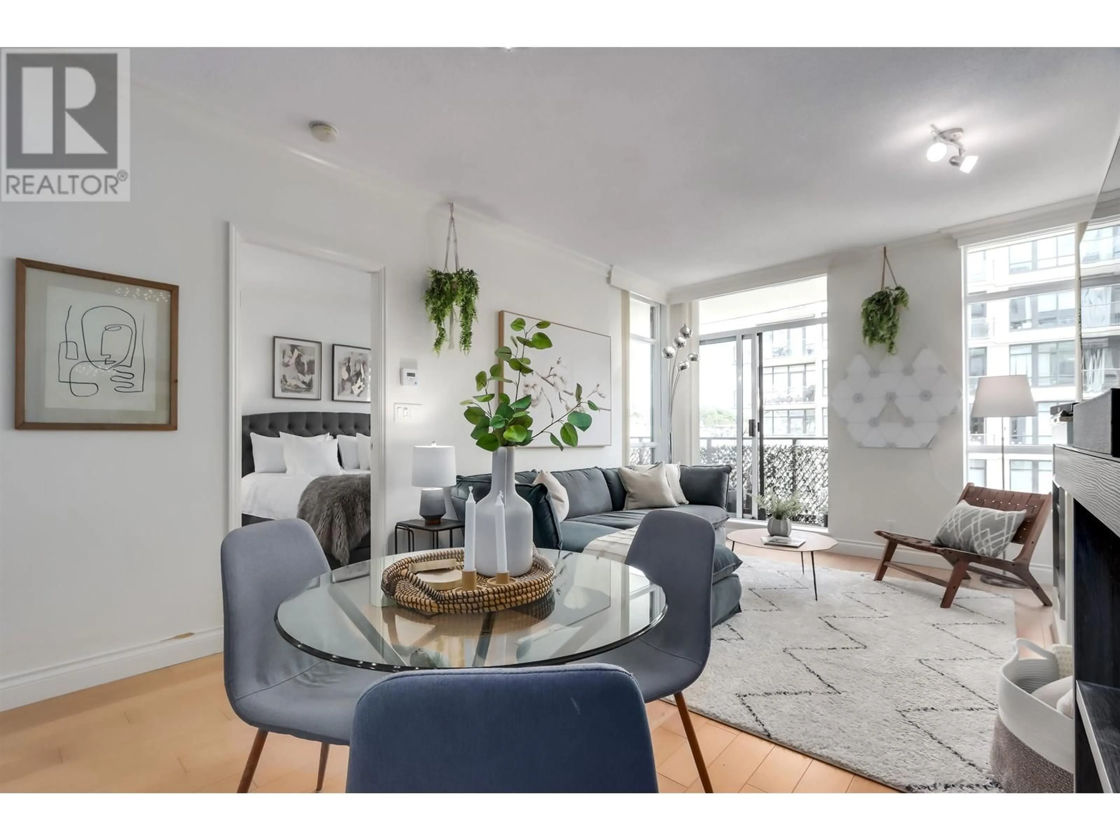 Living room with furniture, unknown for 903 - 162 VICTORY SHIP WAY, North Vancouver British Columbia V7L0B4