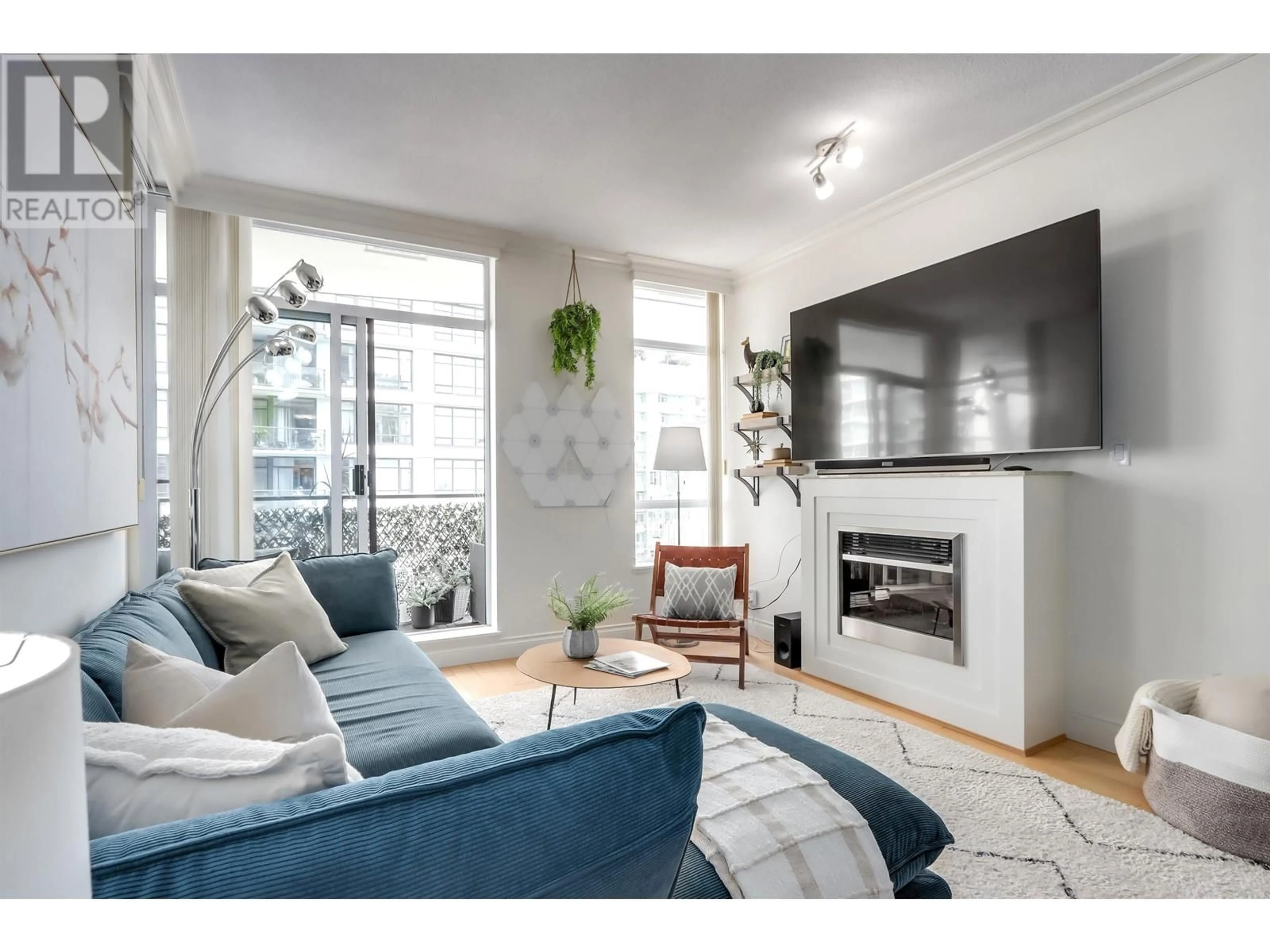 Living room with furniture, unknown for 903 - 162 VICTORY SHIP WAY, North Vancouver British Columbia V7L0B4