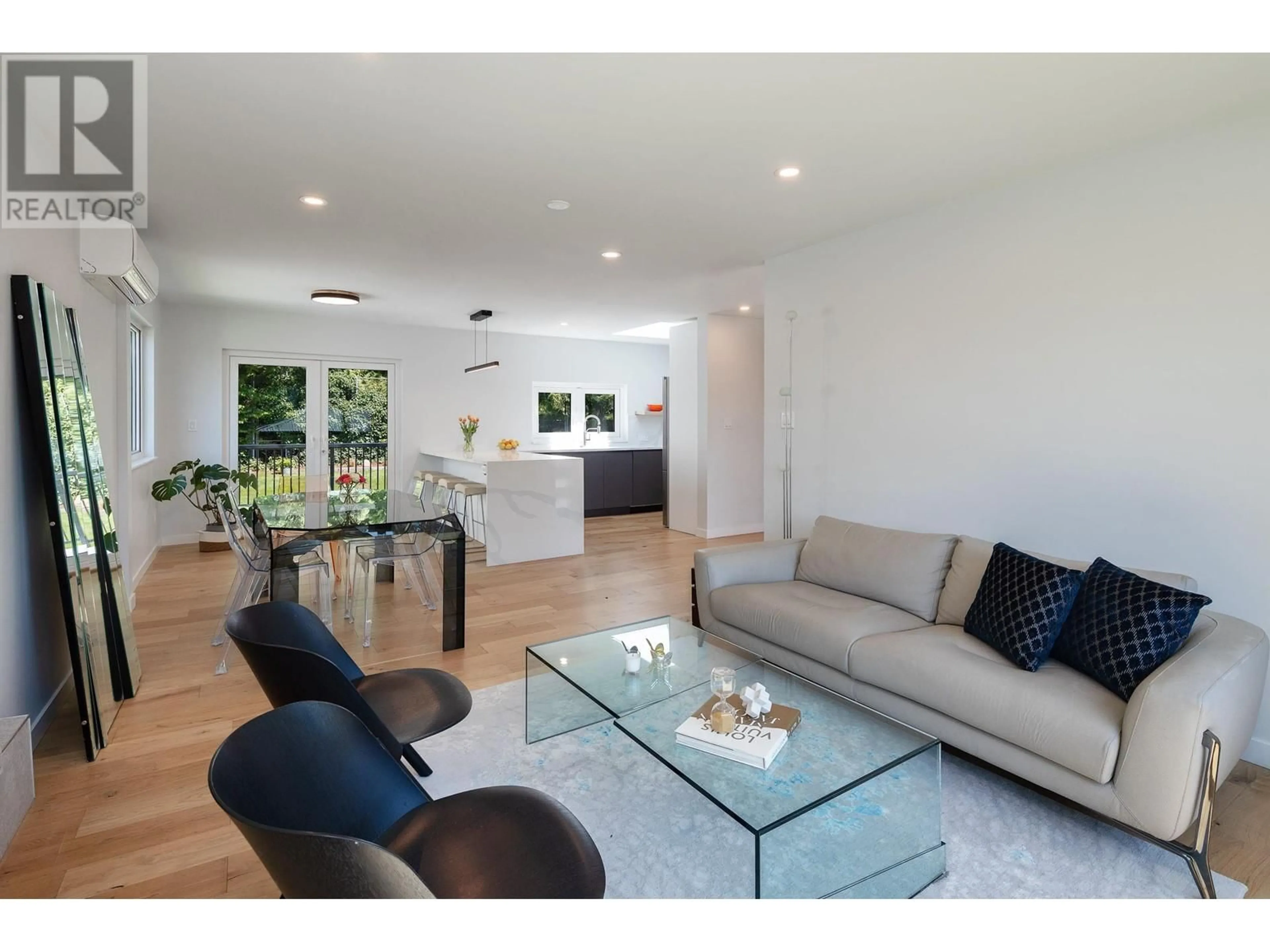 Living room with furniture, wood/laminate floor for 2996 PLYMOUTH DRIVE, North Vancouver British Columbia V7H1C7