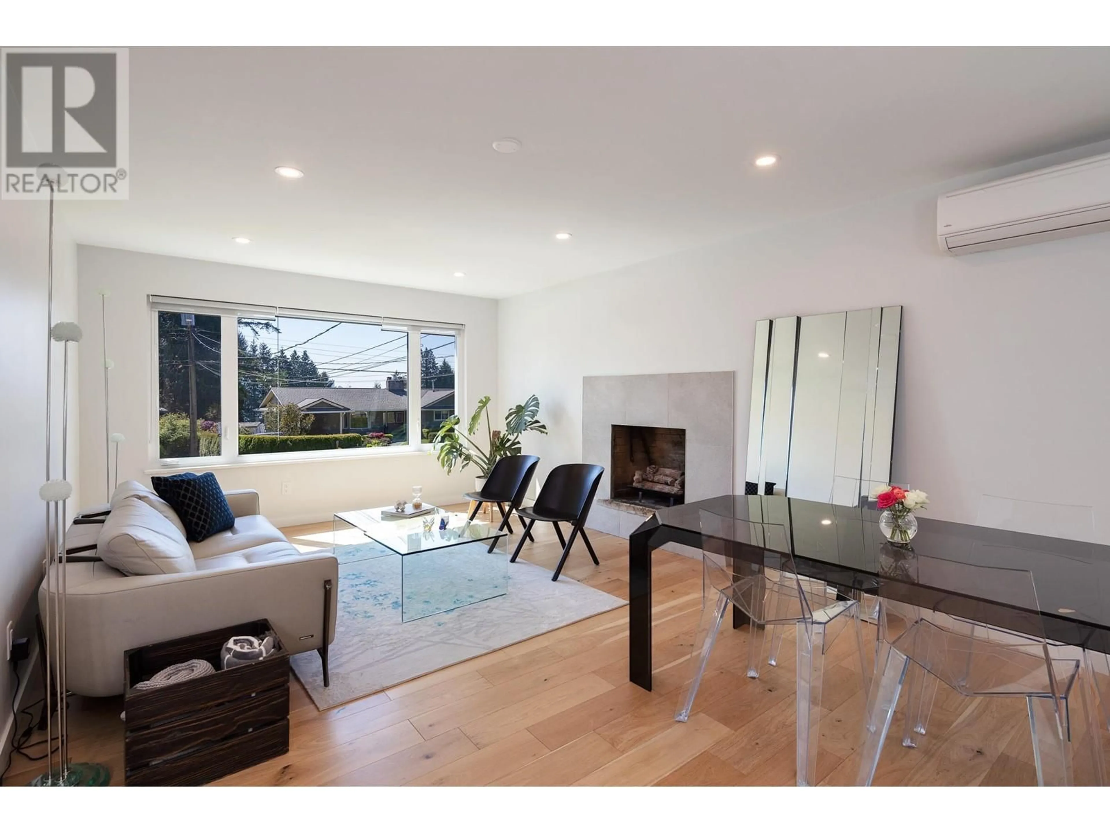 Living room with furniture, wood/laminate floor for 2996 PLYMOUTH DRIVE, North Vancouver British Columbia V7H1C7