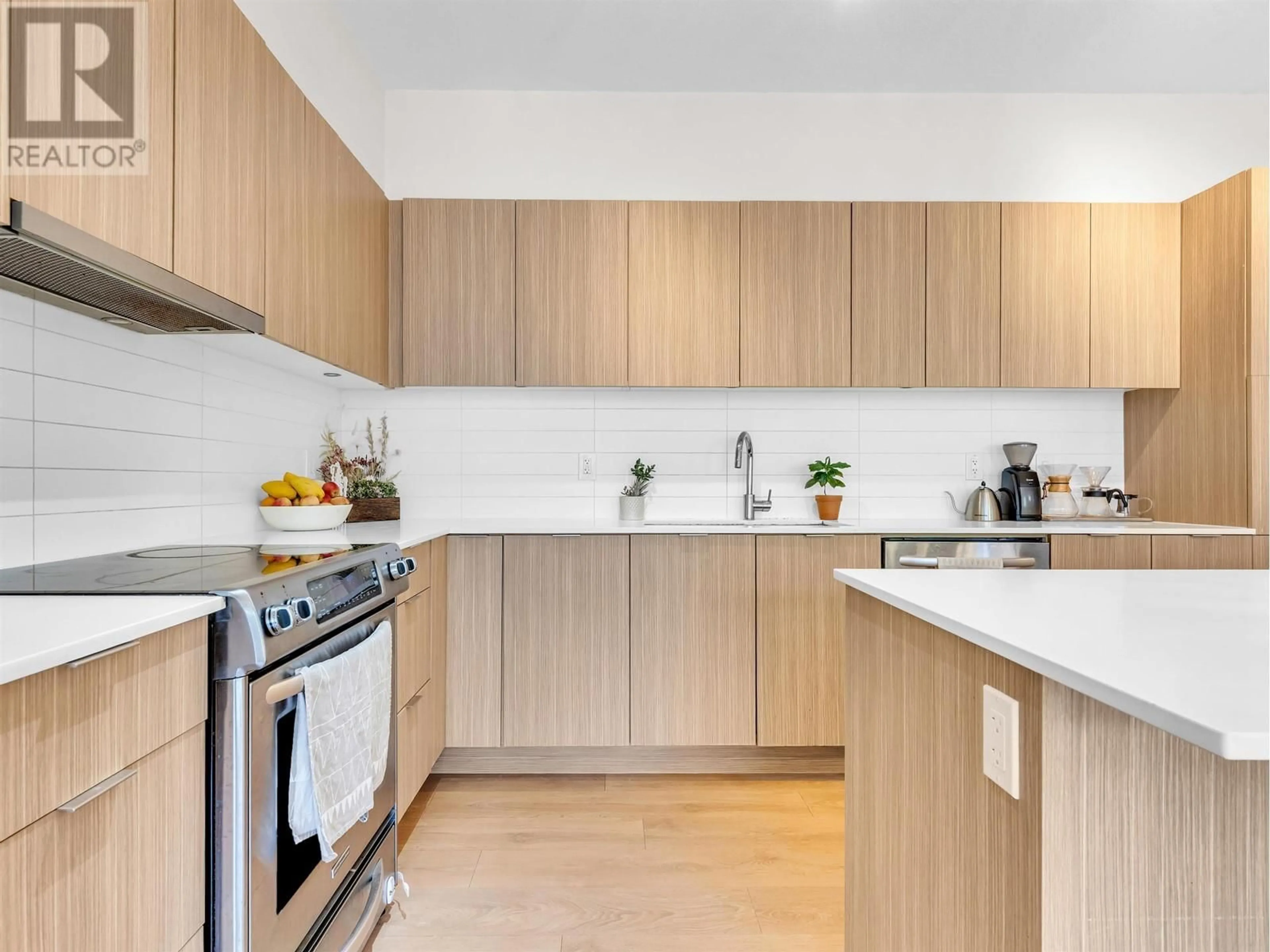 Standard kitchen, wood/laminate floor for 57 - 3728 THURSTON STREET, Burnaby British Columbia V5H0E6