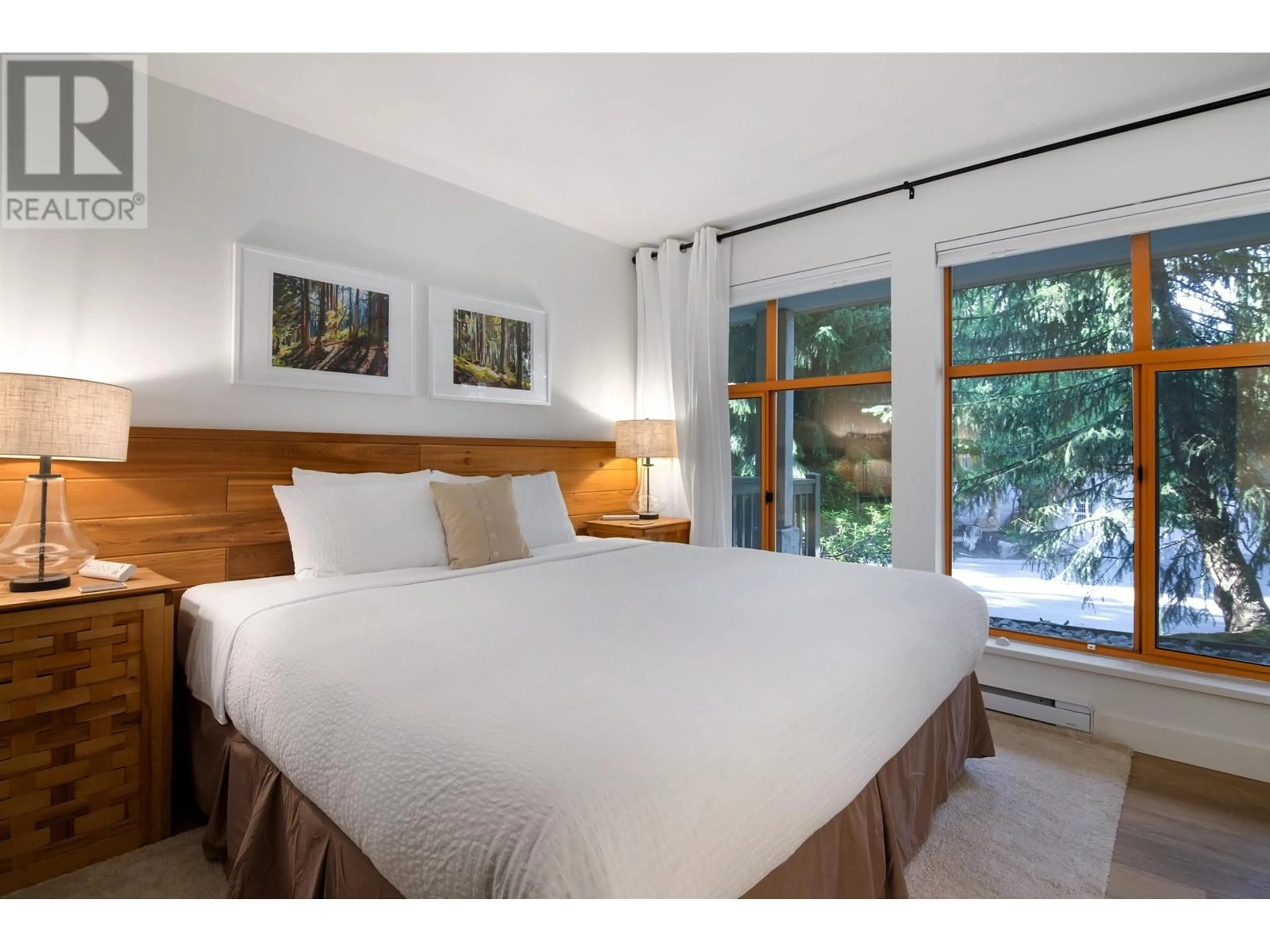 Bedroom with bed, wood/laminate floor for 109 - 4355 NORTHLANDS BOULEVARD, Whistler British Columbia V8E1C3