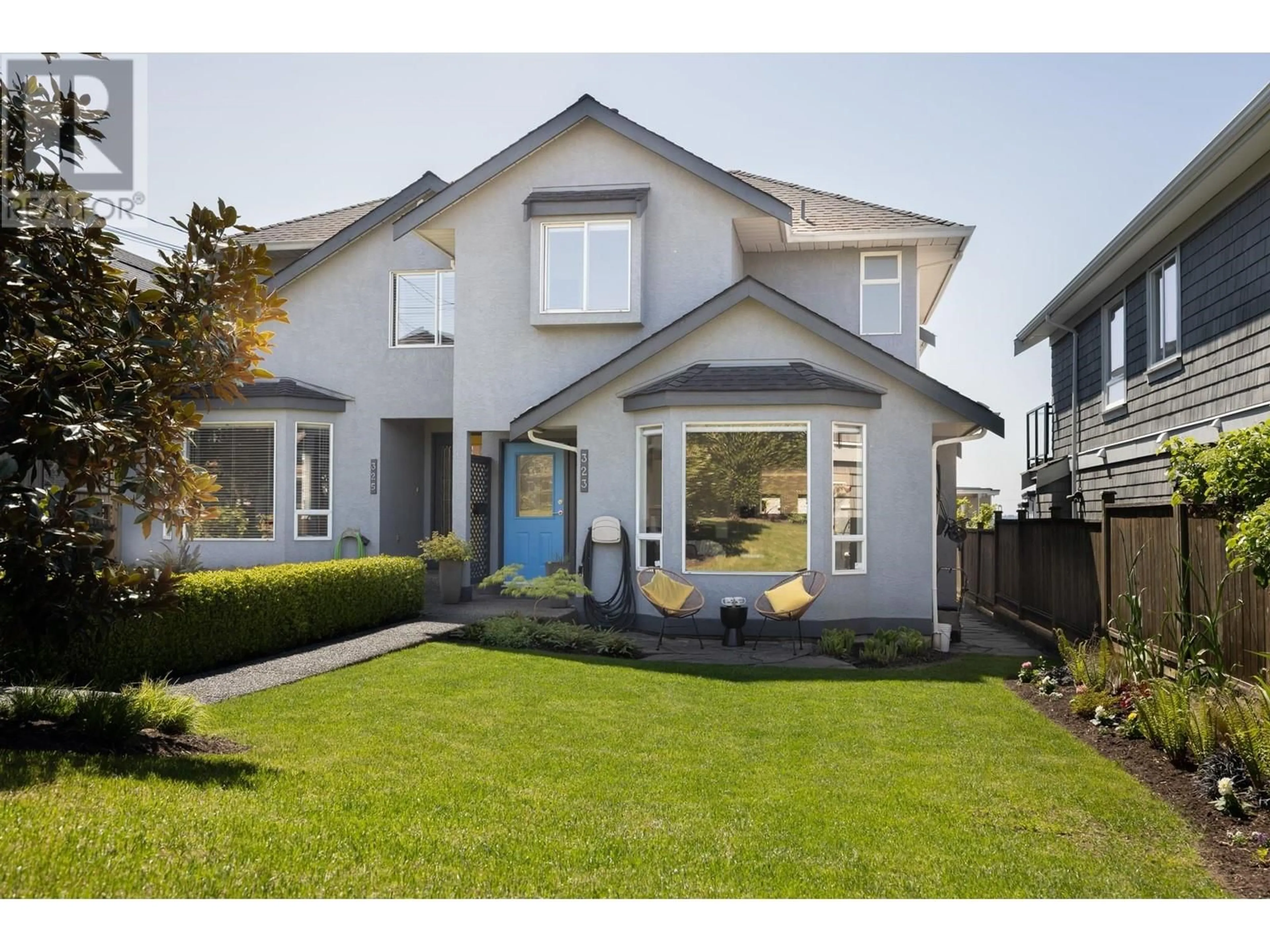 Home with vinyl exterior material, street for 323 8TH STREET, North Vancouver British Columbia V7L1Z2
