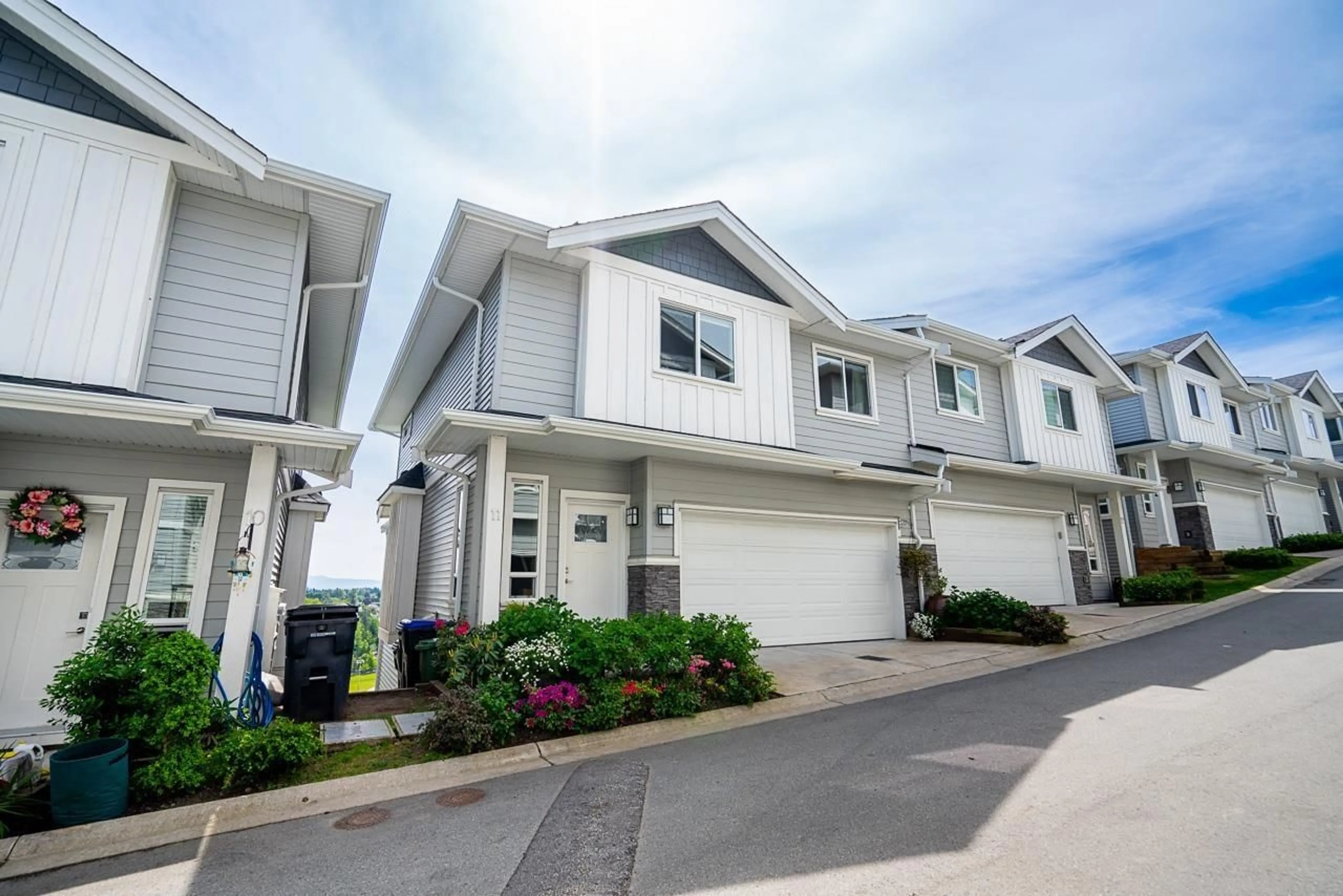 Home with vinyl exterior material, street for 11 - 31548 UPPER MACLURE, Abbotsford British Columbia V2T5P1