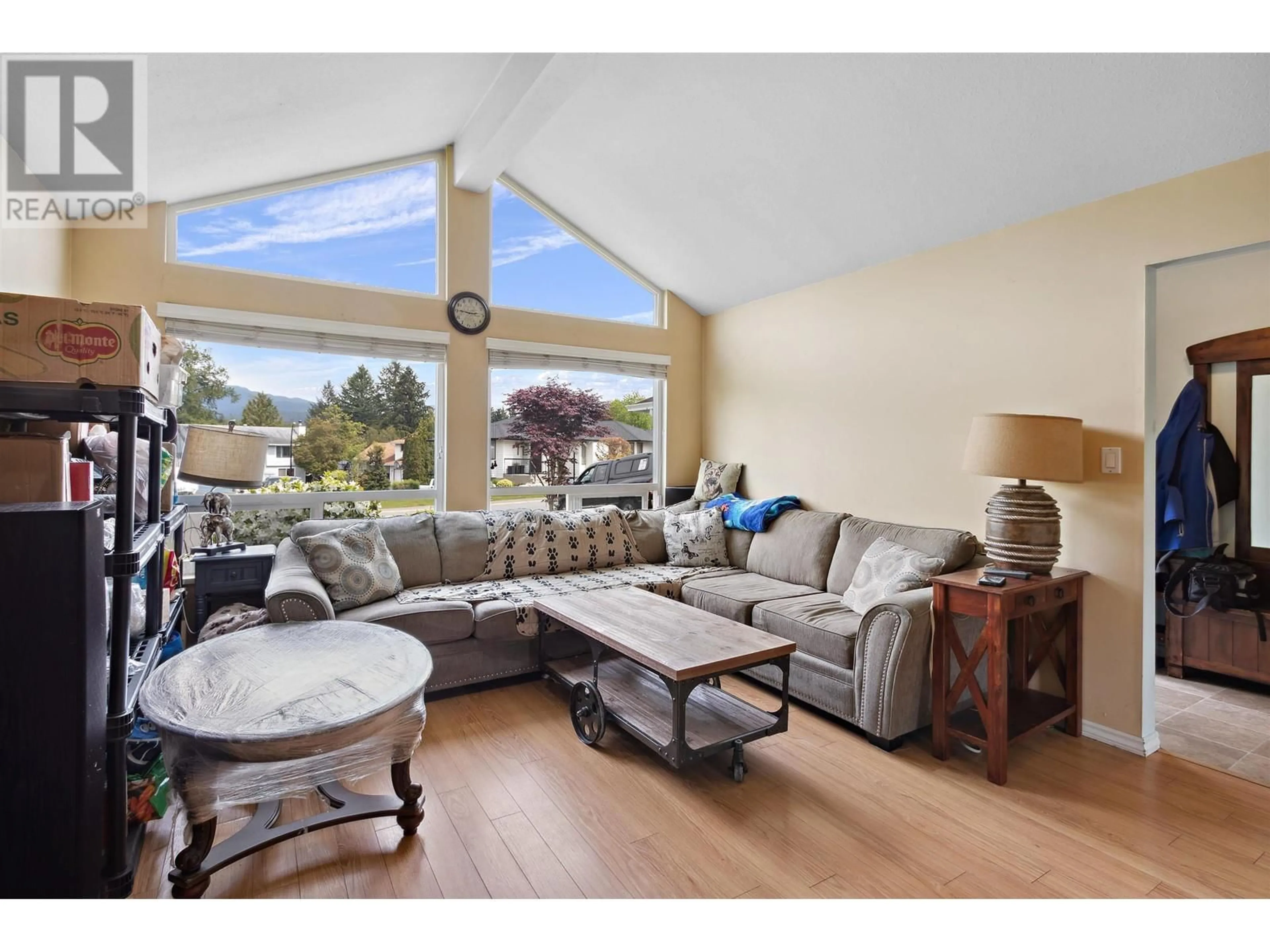 Living room with furniture, wood/laminate floor for 22640 125A AVENUE, Maple Ridge British Columbia V2X9Z6