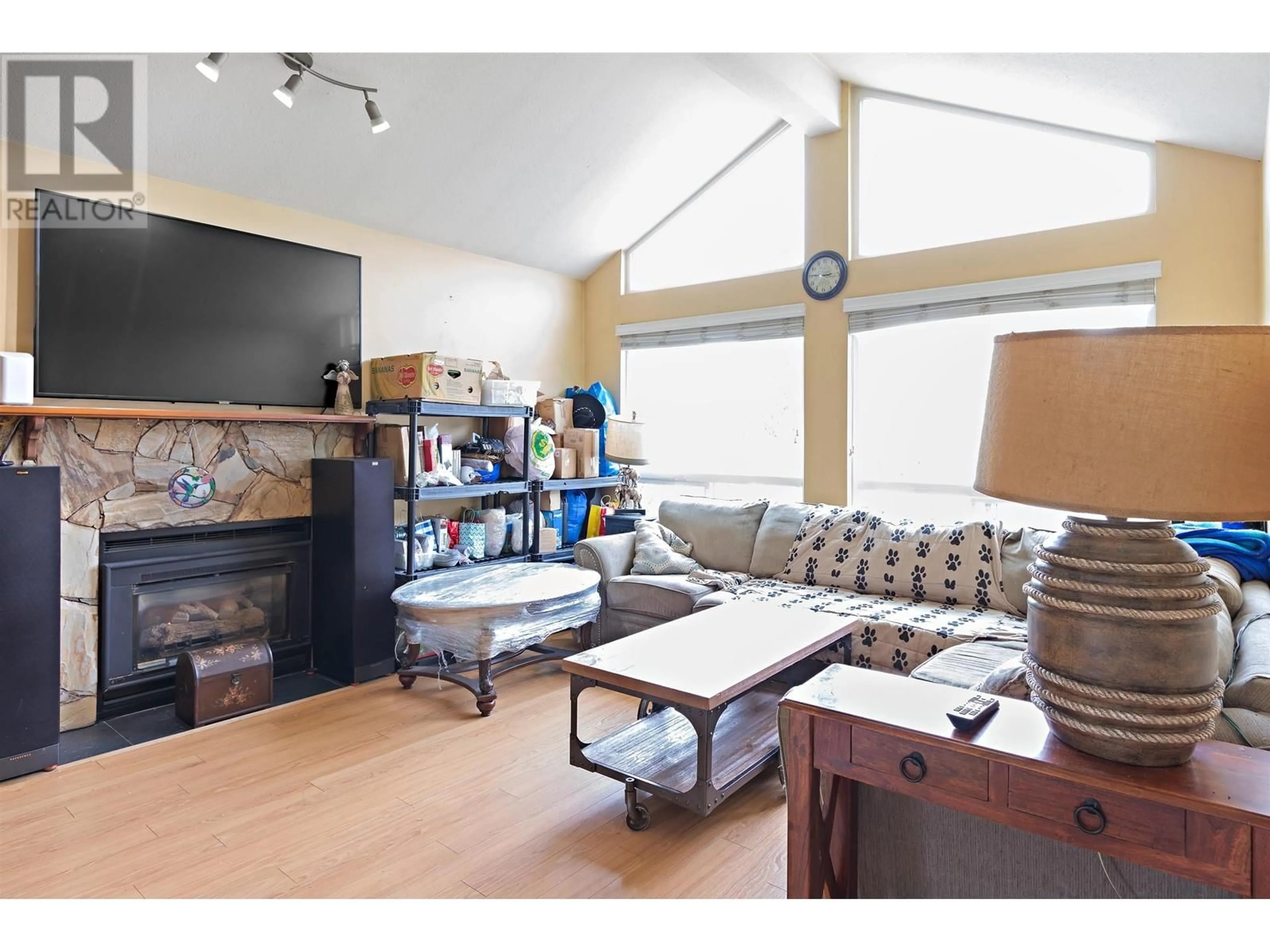 Living room with furniture, wood/laminate floor for 22640 125A AVENUE, Maple Ridge British Columbia V2X9Z6