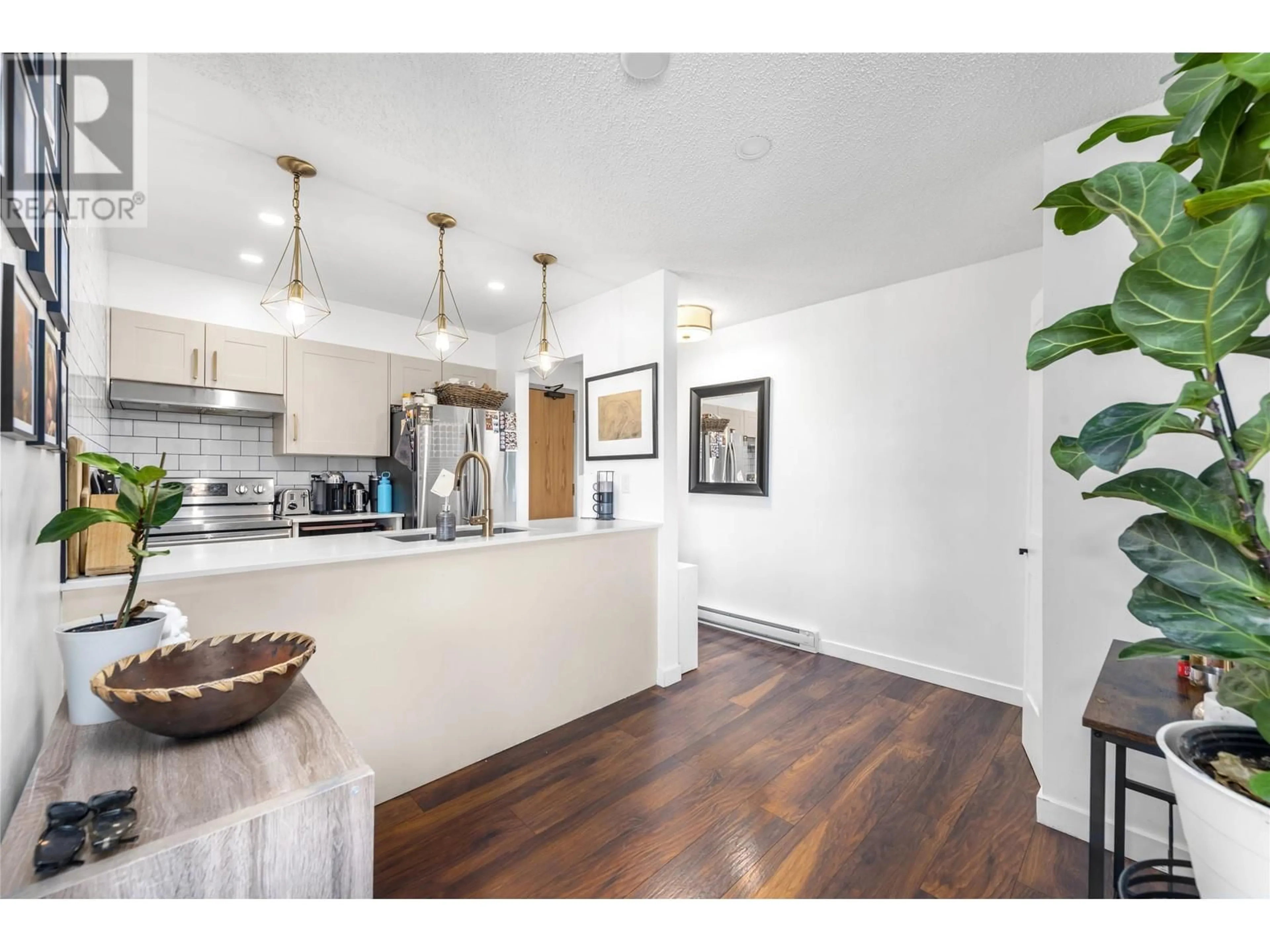 Open concept kitchen, wood/laminate floor for 306 - 1365 4TH AVENUE, Vancouver British Columbia V6H3Y8