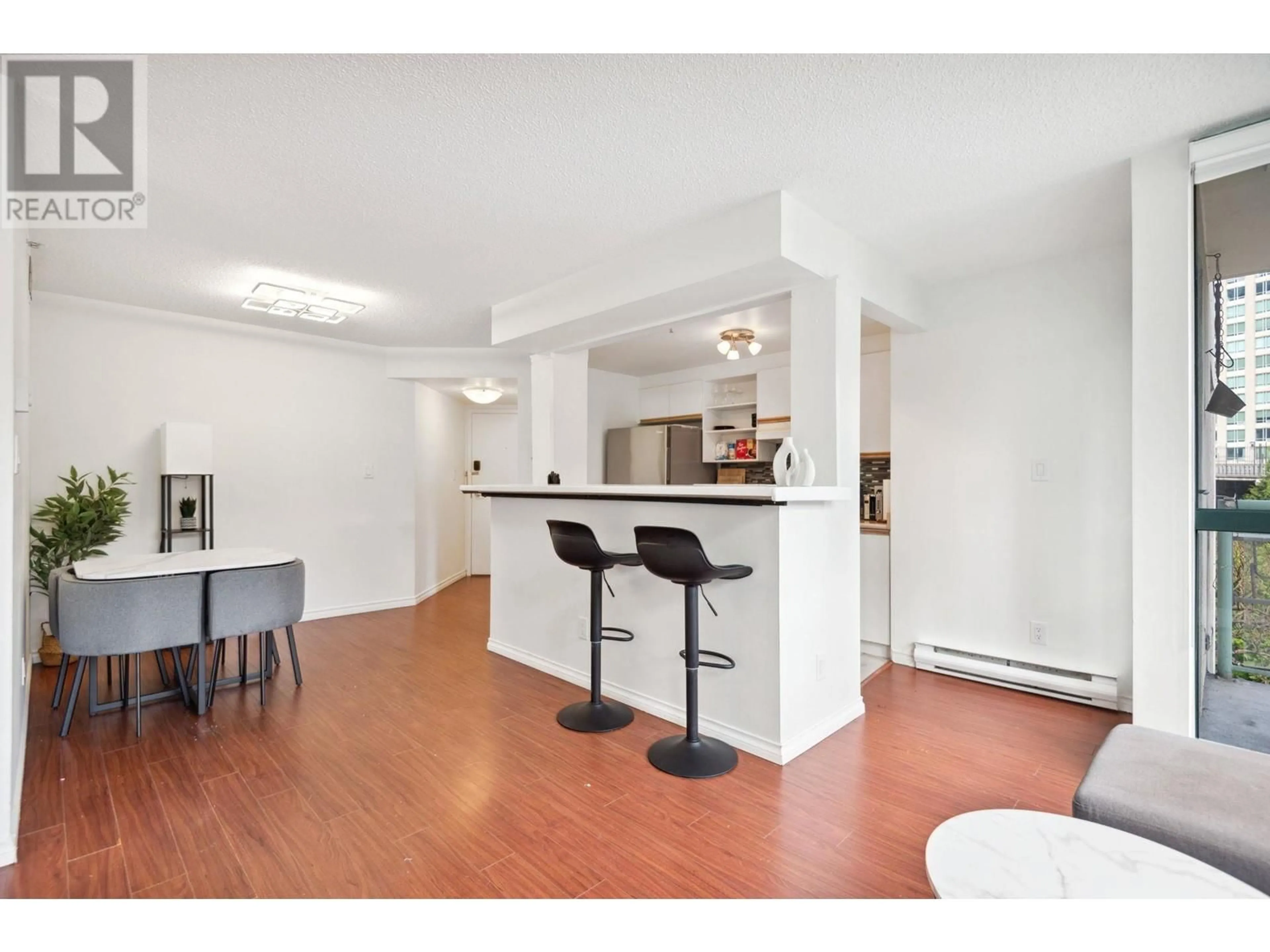Open concept kitchen, wood/laminate floor for 505 - 907 BEACH AVENUE, Vancouver British Columbia V6Z2R3