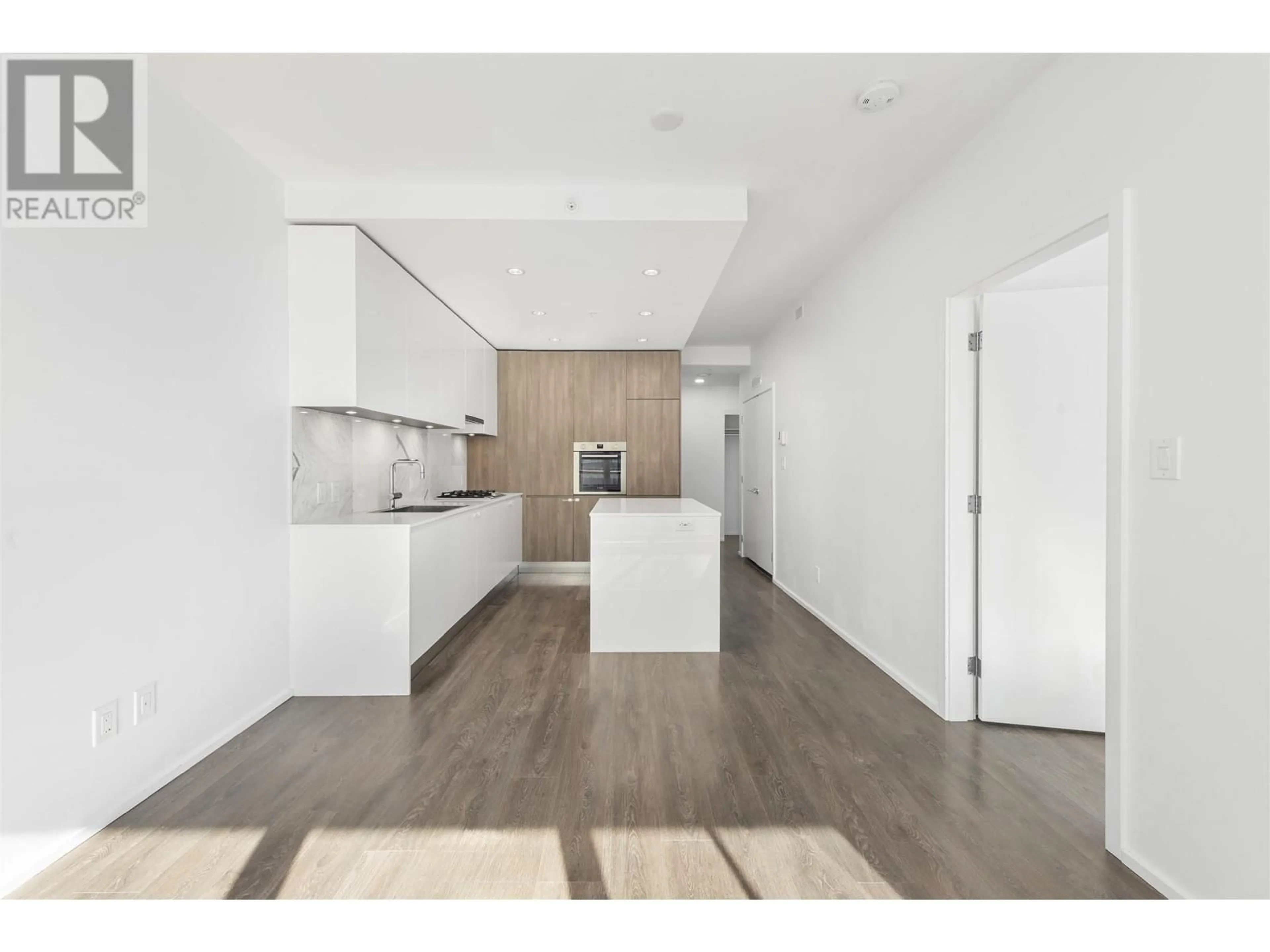 Open concept kitchen, wood/laminate floor for 606 - 4650 BRENTWOOD BOULEVARD, Burnaby British Columbia V5C0M3