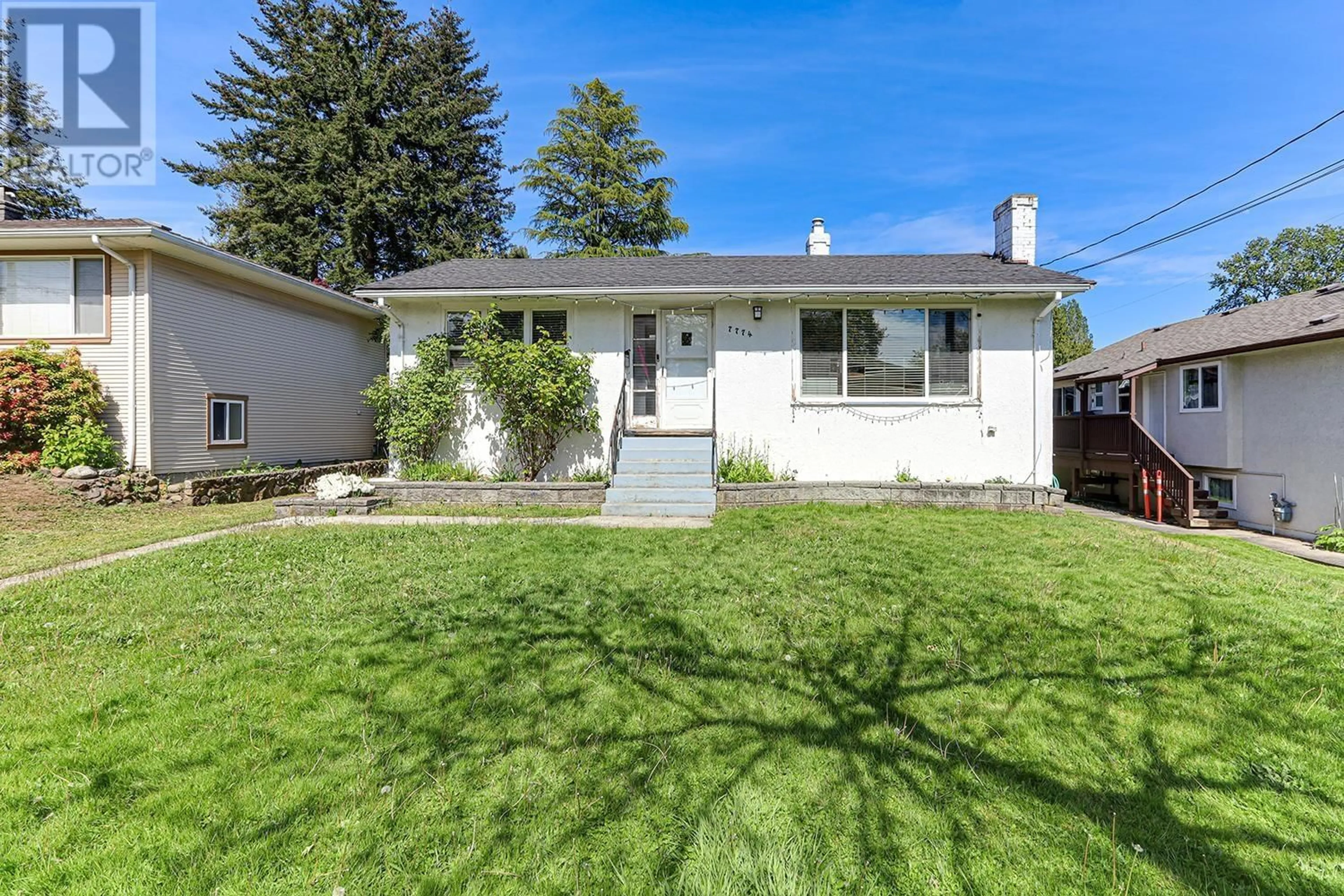 Home with vinyl exterior material, street for 7774 MARY AVENUE, Burnaby British Columbia V3N3G8