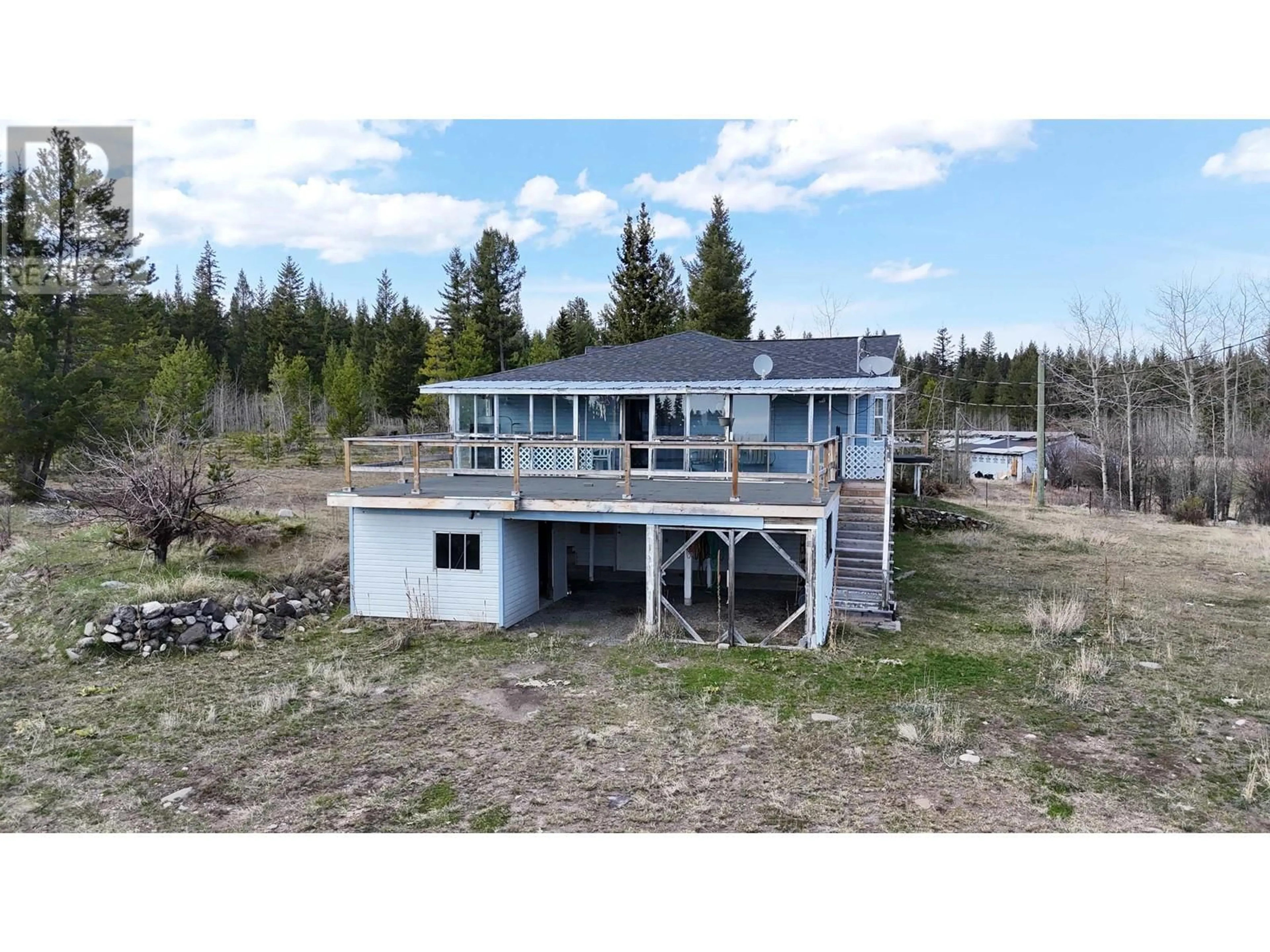 A pic from outside/outdoor area/front of a property/back of a property/a pic from drone, water/lake/river/ocean view for 3405 KOKANEE PIT ROAD, Lac La Hache British Columbia V0K1T1