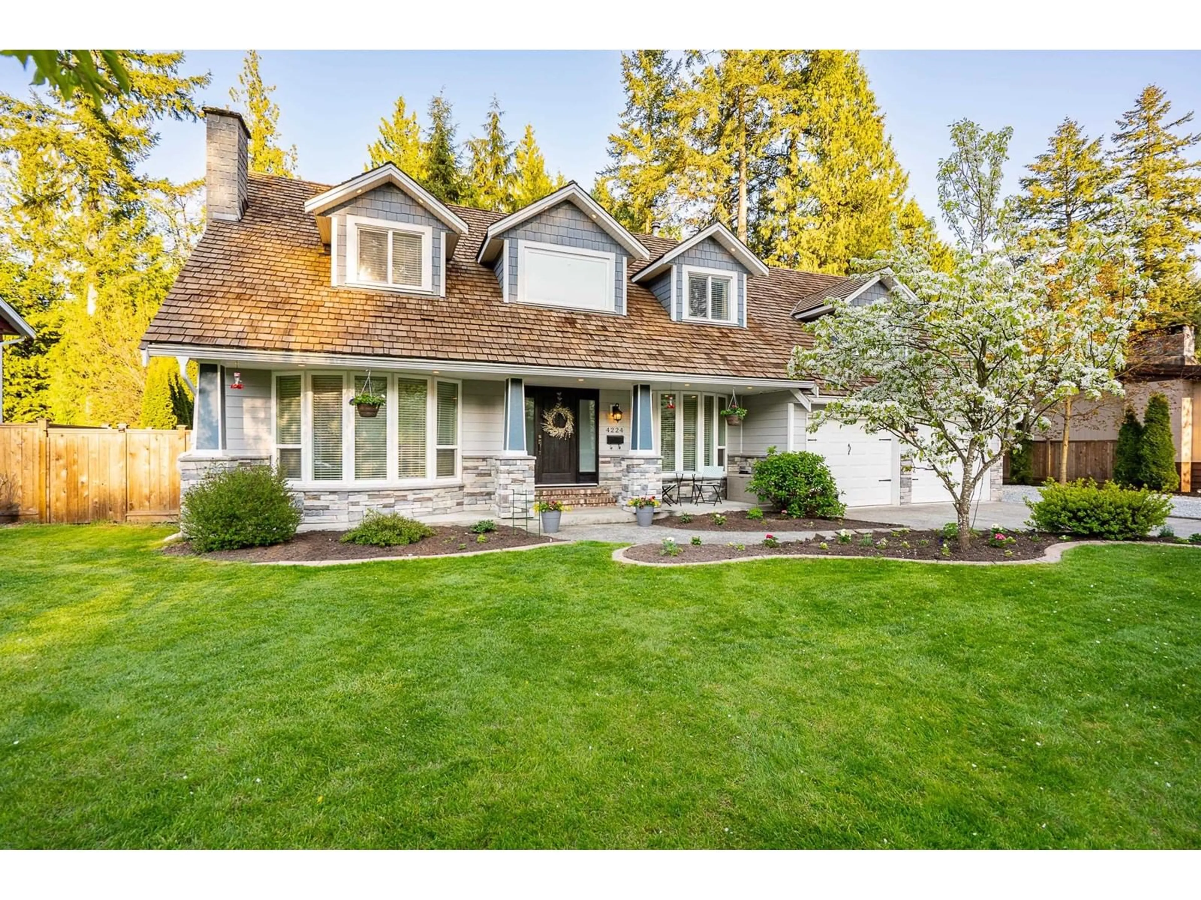 Home with vinyl exterior material, street for 4224 196B, Langley British Columbia V3A1B1