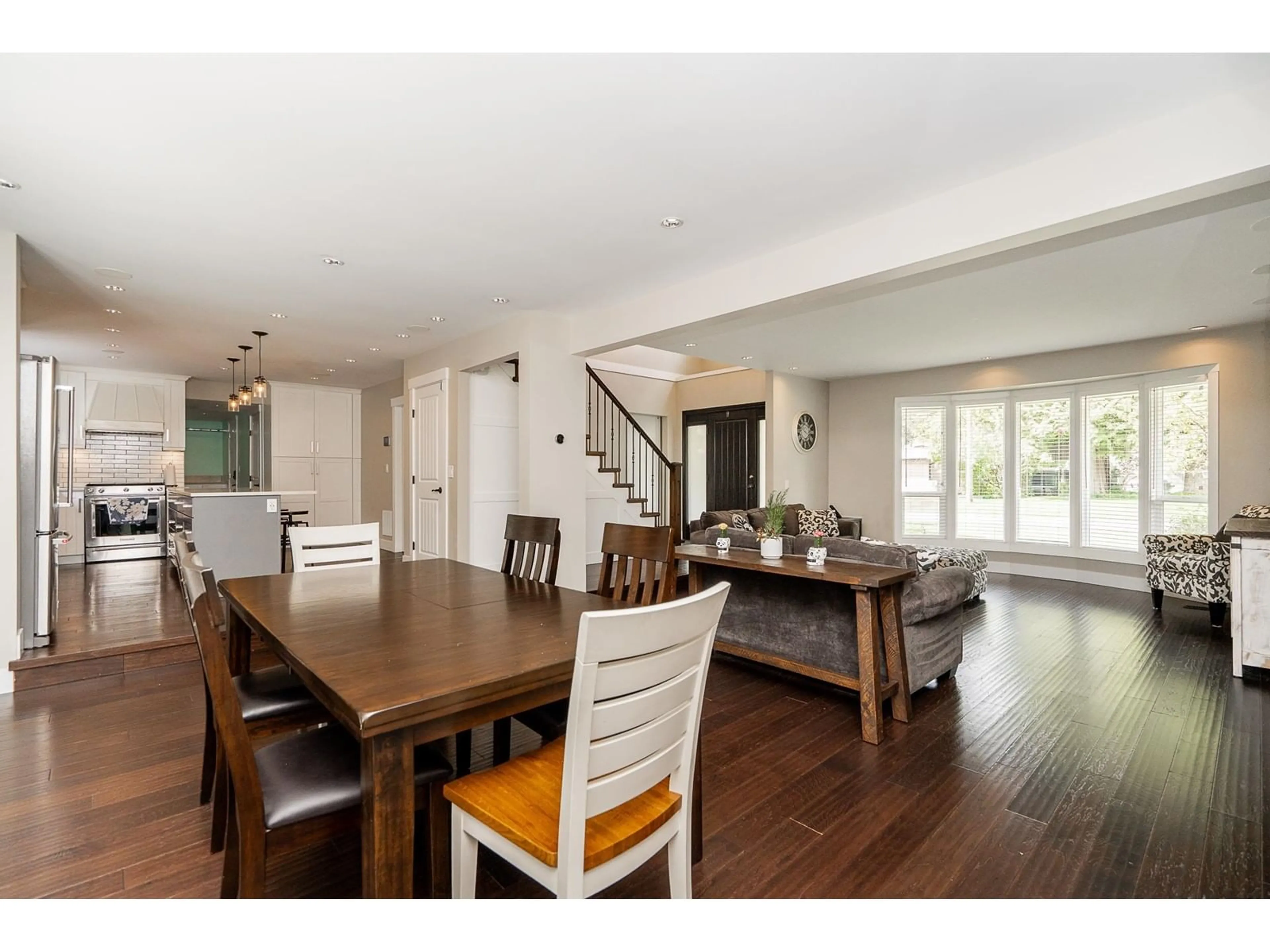 Open concept kitchen, wood/laminate floor for 4224 196B, Langley British Columbia V3A1B1