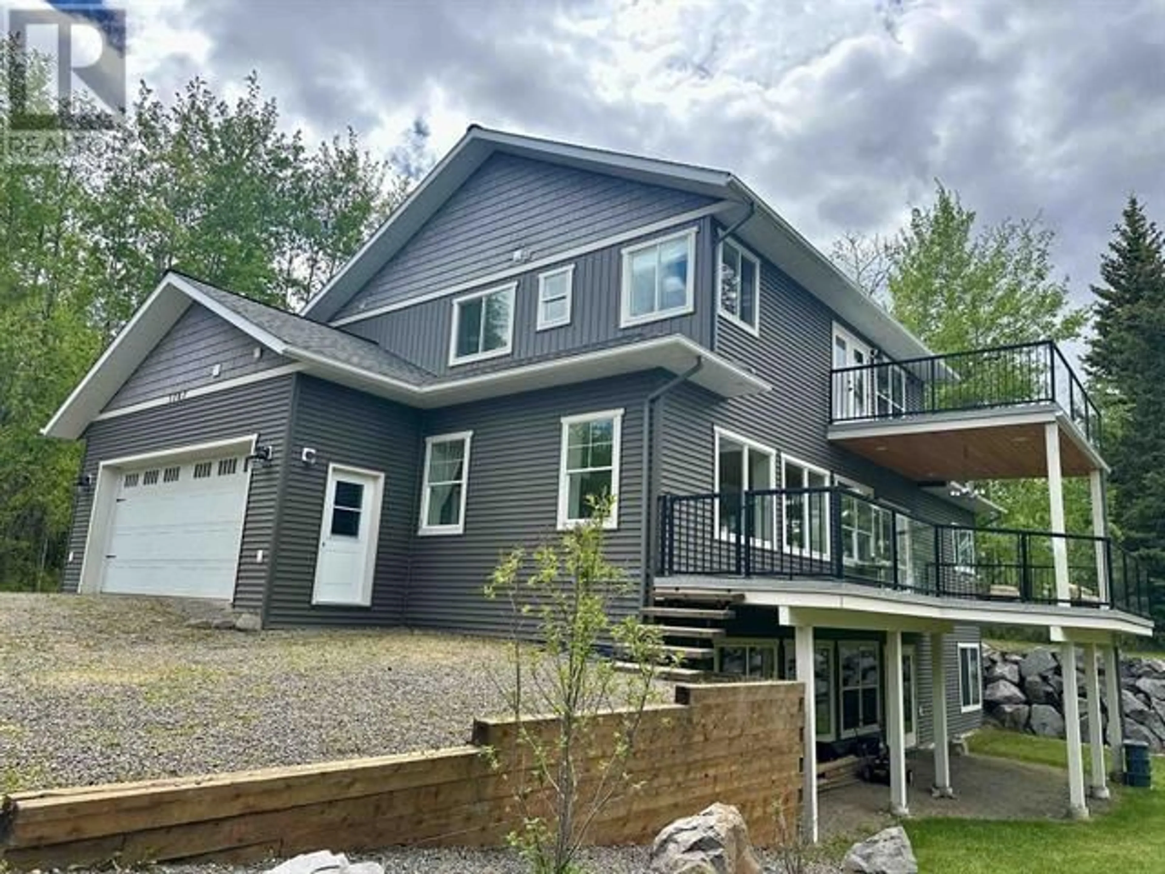 Home with vinyl exterior material, mountain view for 1787 16 HIGHWAY, Vanderhoof British Columbia V0J3A0