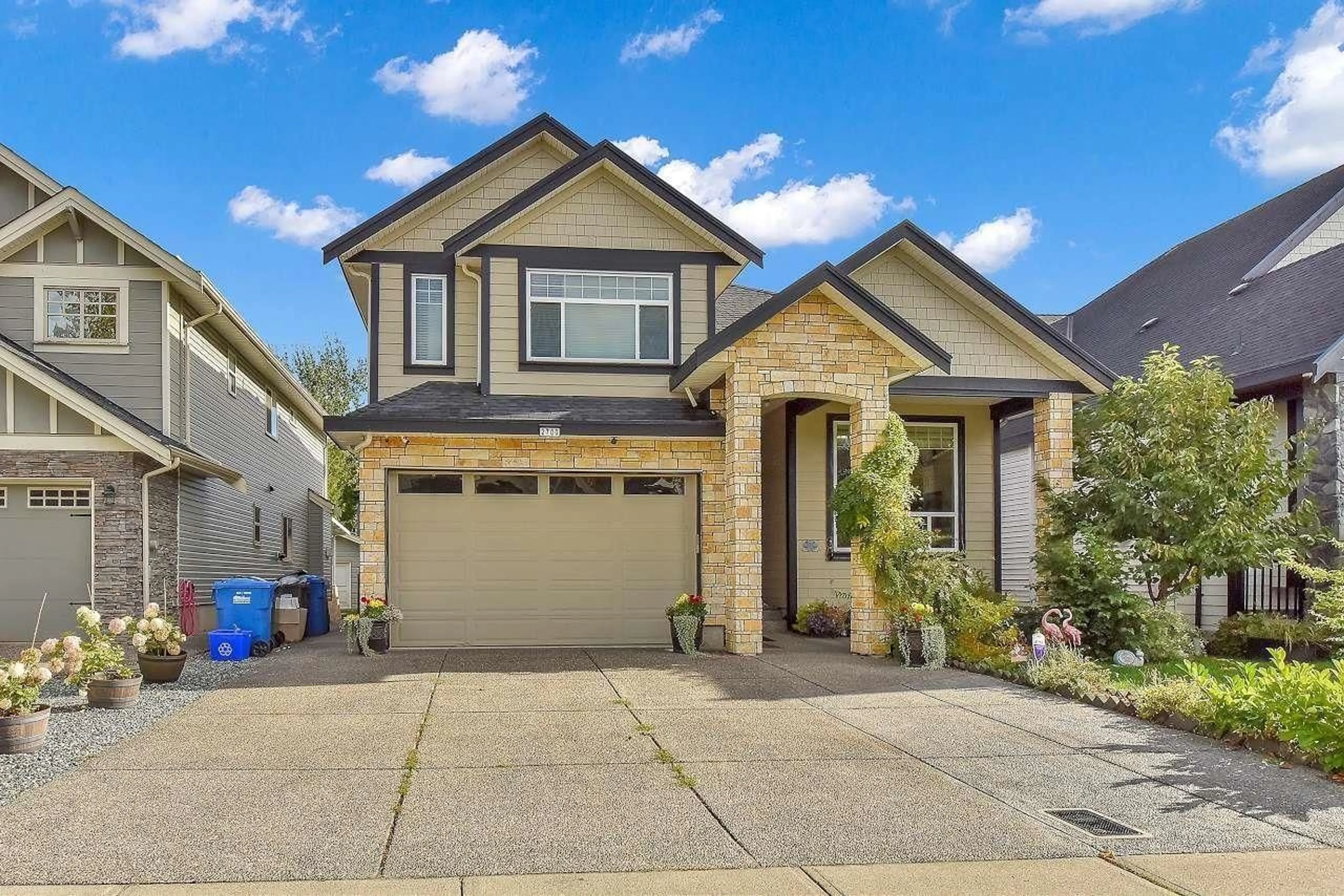 Home with vinyl exterior material, street for 2700 CABOOSE, Abbotsford British Columbia V4X0B8