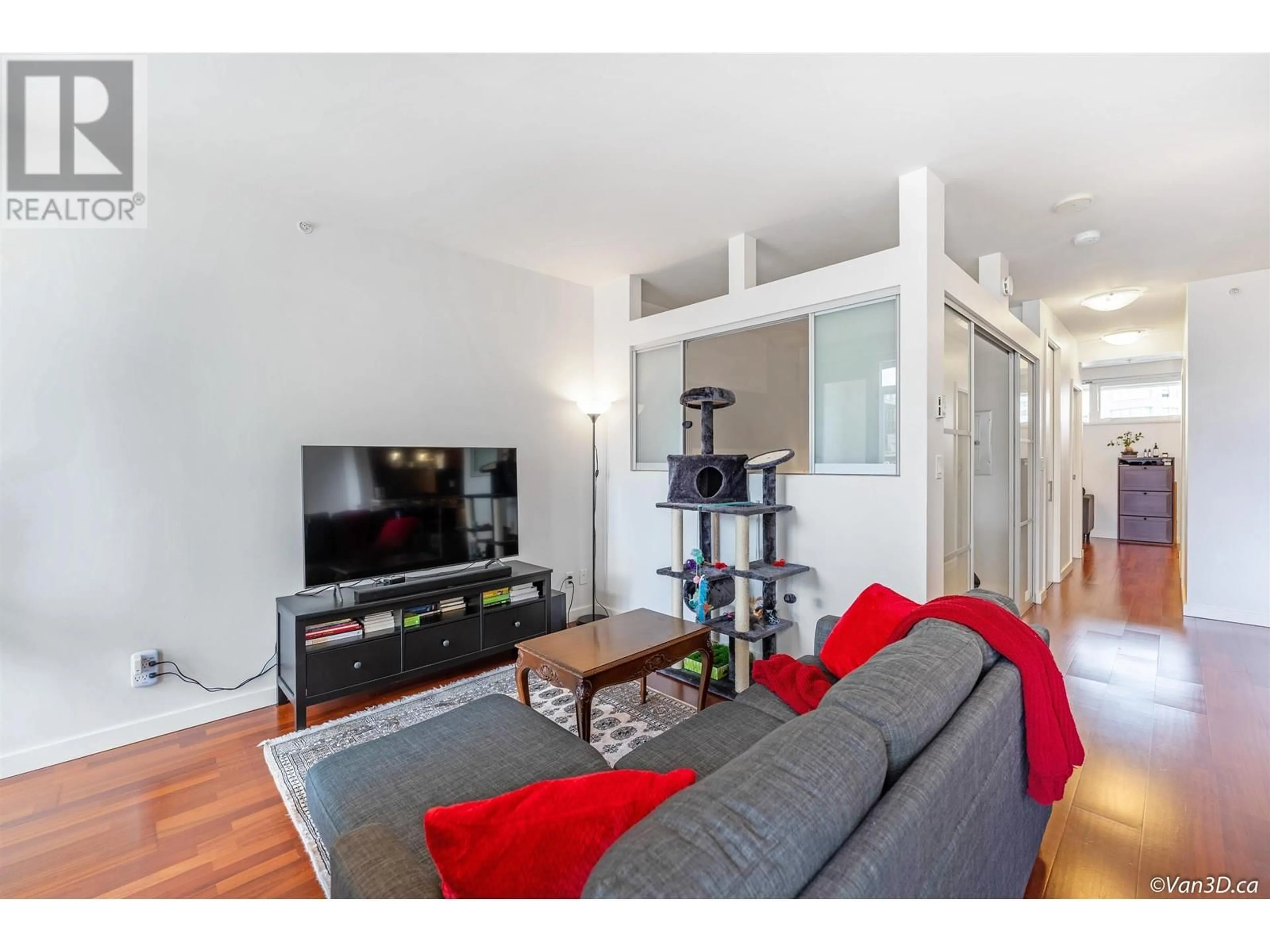 Living room with furniture, wood/laminate floor for 306 - 2055 YUKON STREET, Vancouver British Columbia V5Y4B7