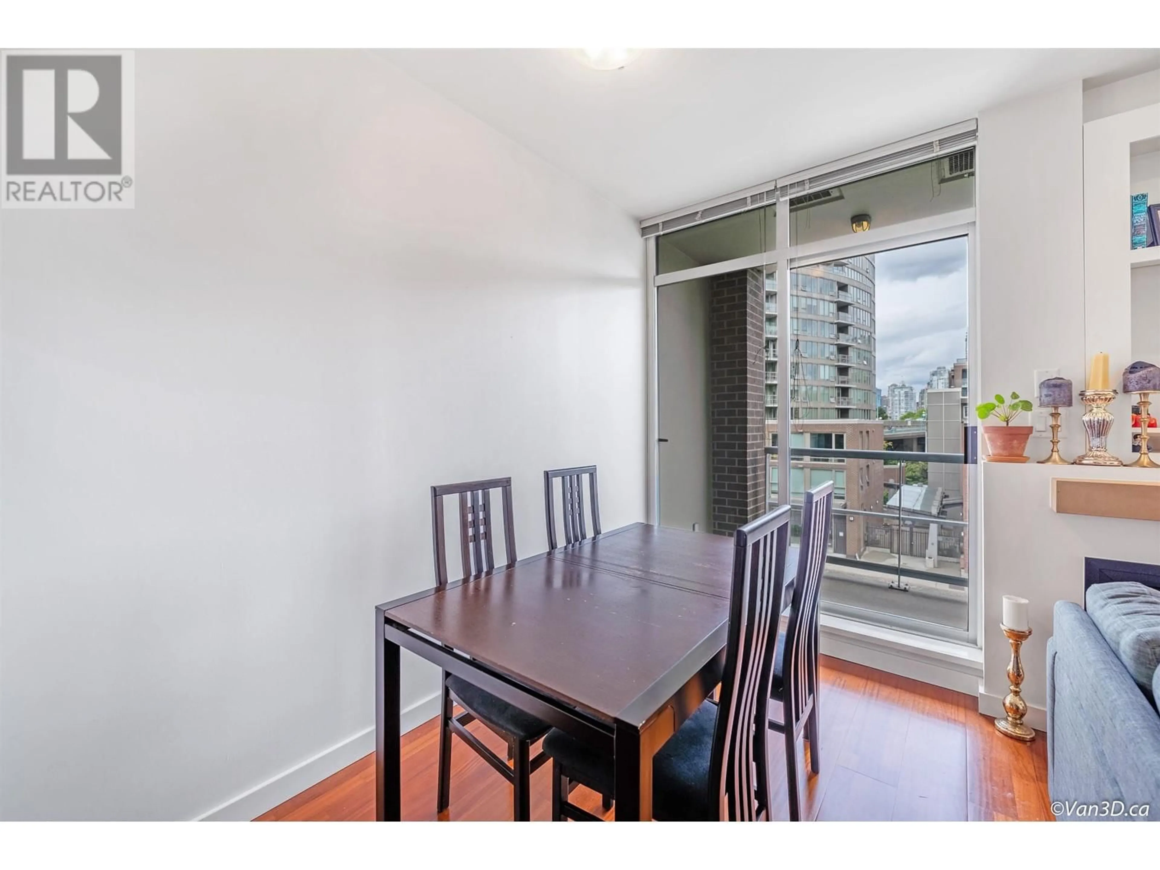 Dining room, wood/laminate floor for 306 - 2055 YUKON STREET, Vancouver British Columbia V5Y4B7