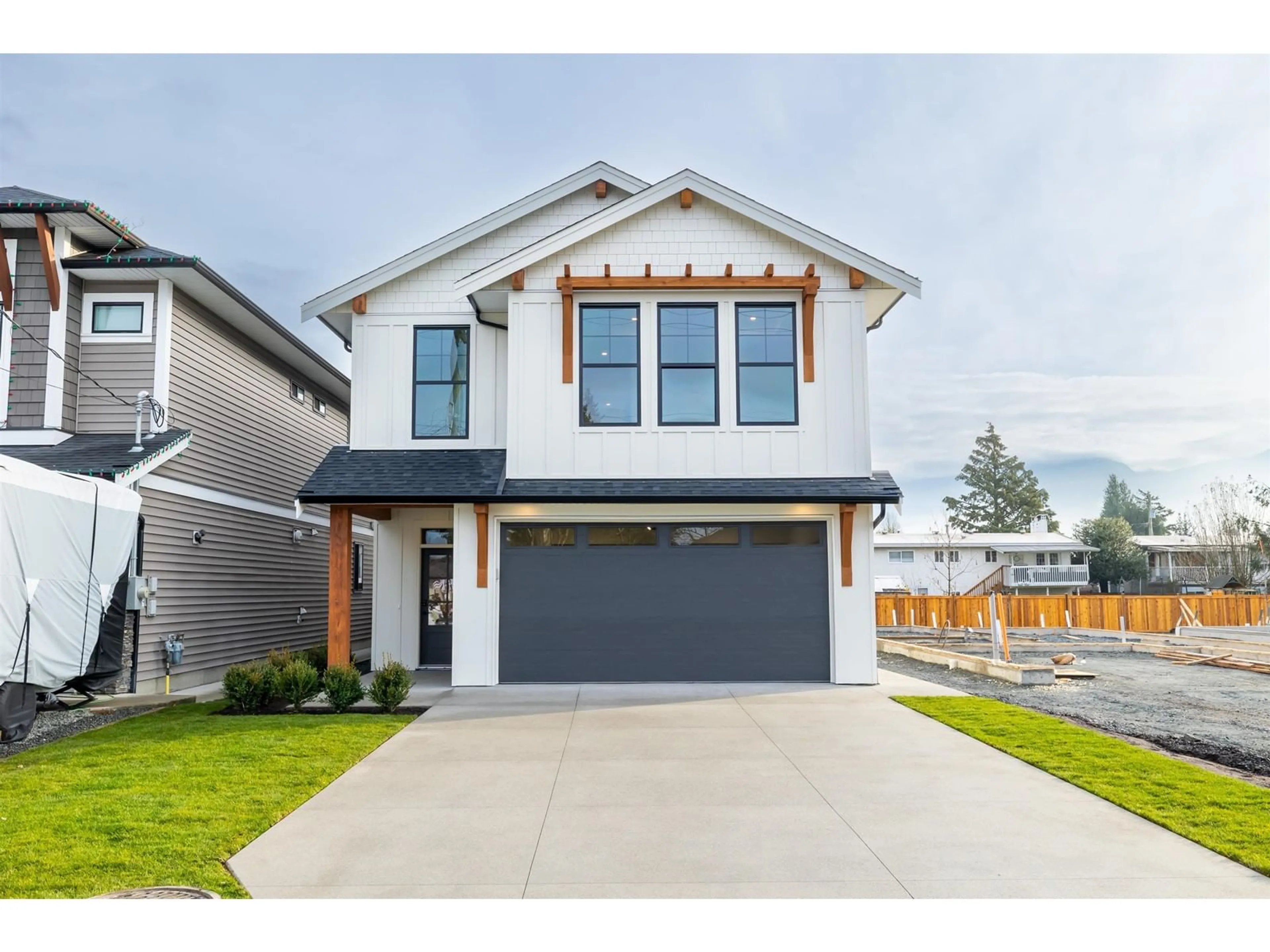 Home with vinyl exterior material, street for 9382 MCNAUGHT ROAD, Chilliwack British Columbia V2P6E8