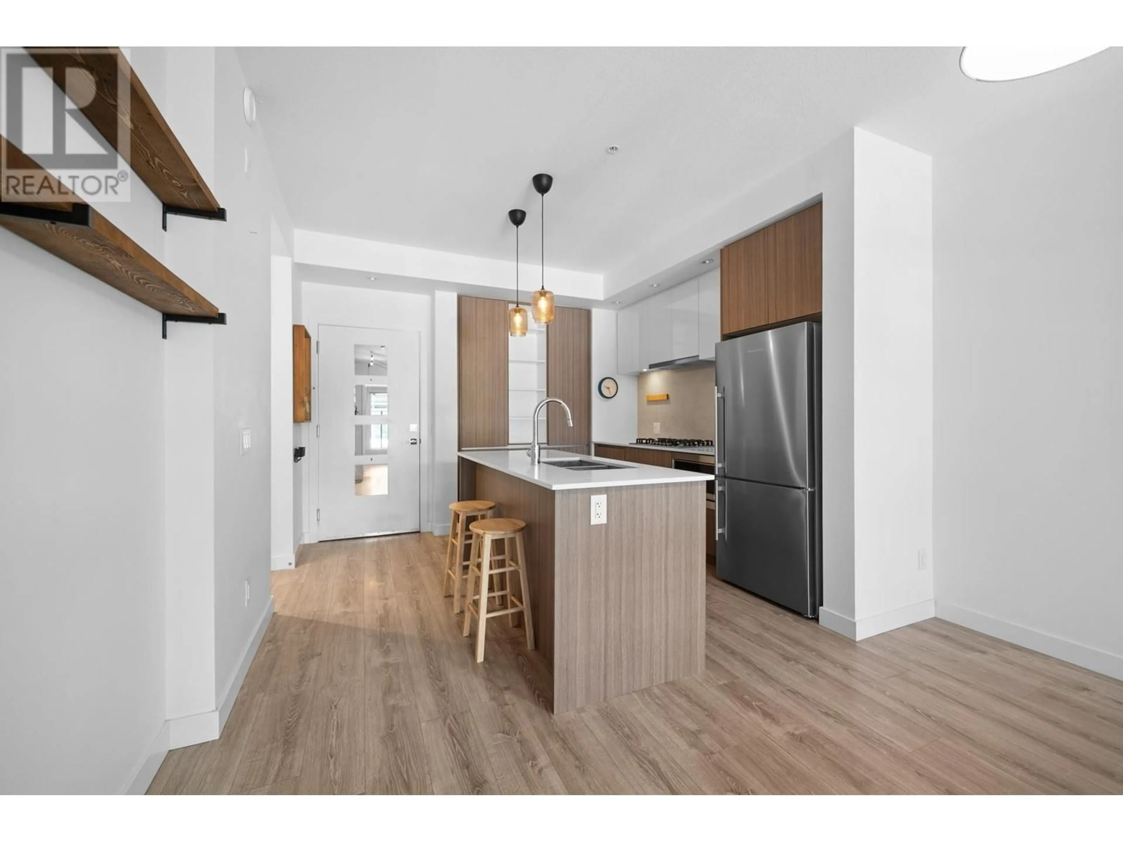 Open concept kitchen, wood/laminate floor for 214 - 516 FOSTER AVENUE, Coquitlam British Columbia V3J0H8