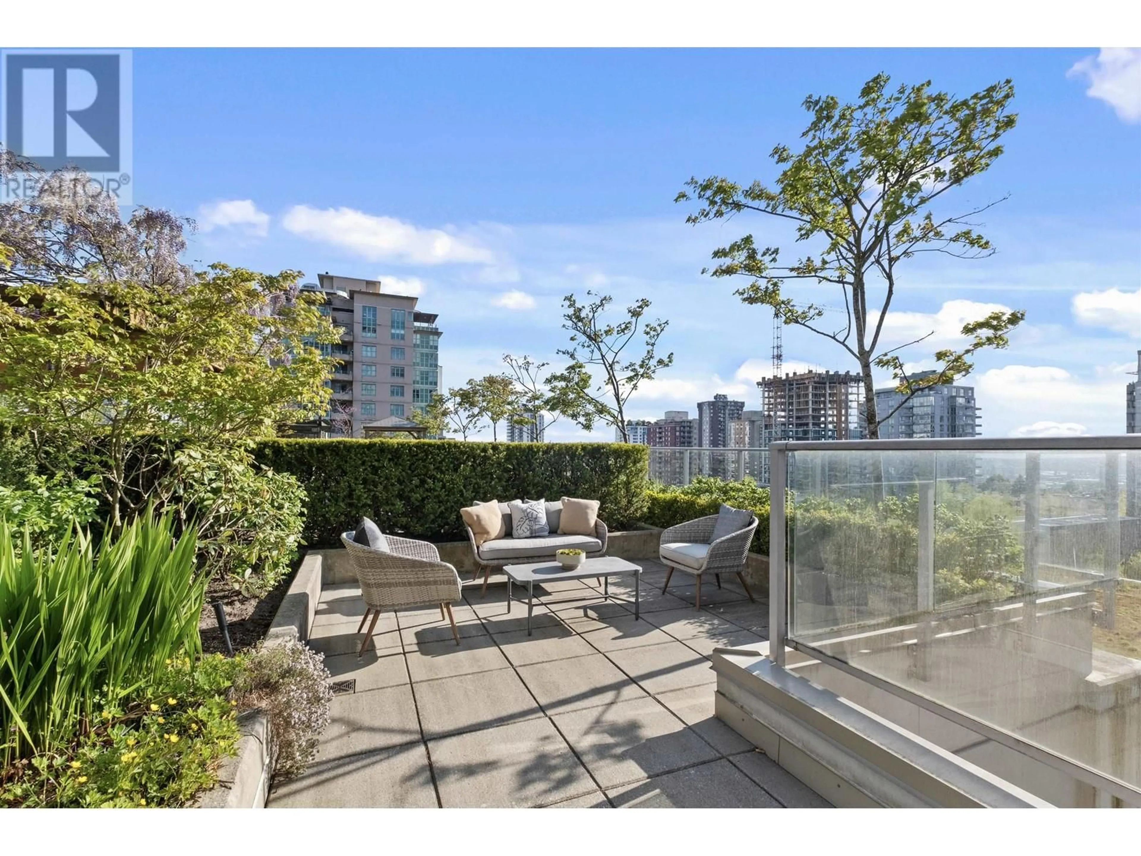 Patio, city buildings view from balcony for 701 - 135 17TH STREET, North Vancouver British Columbia V7L0C4
