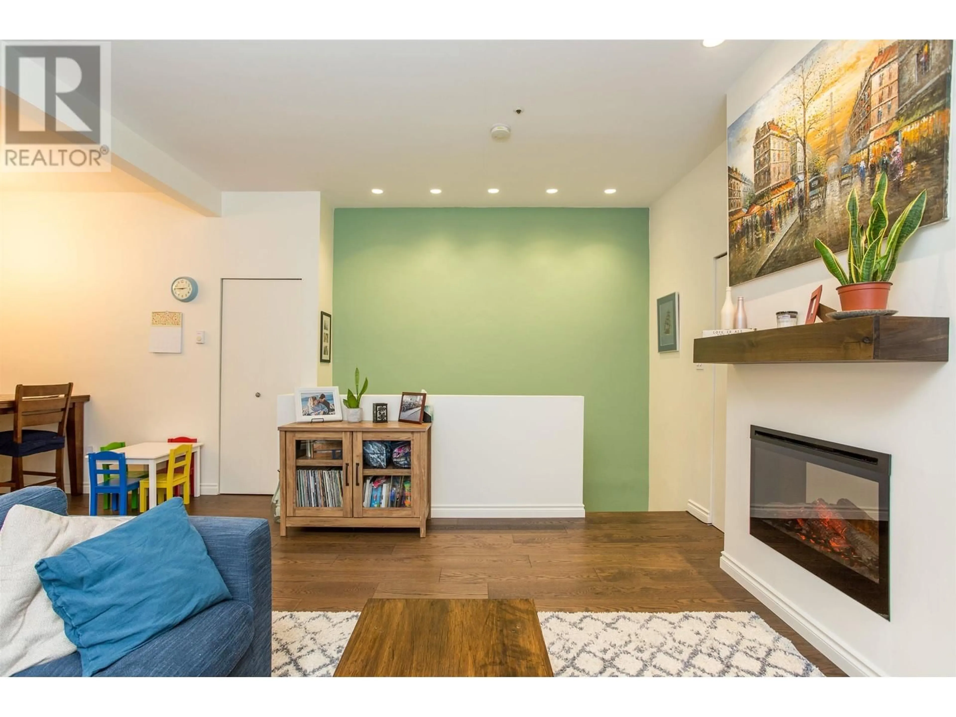Living room with furniture, wood/laminate floor for 819 7TH AVENUE, Vancouver British Columbia V5Z1C2