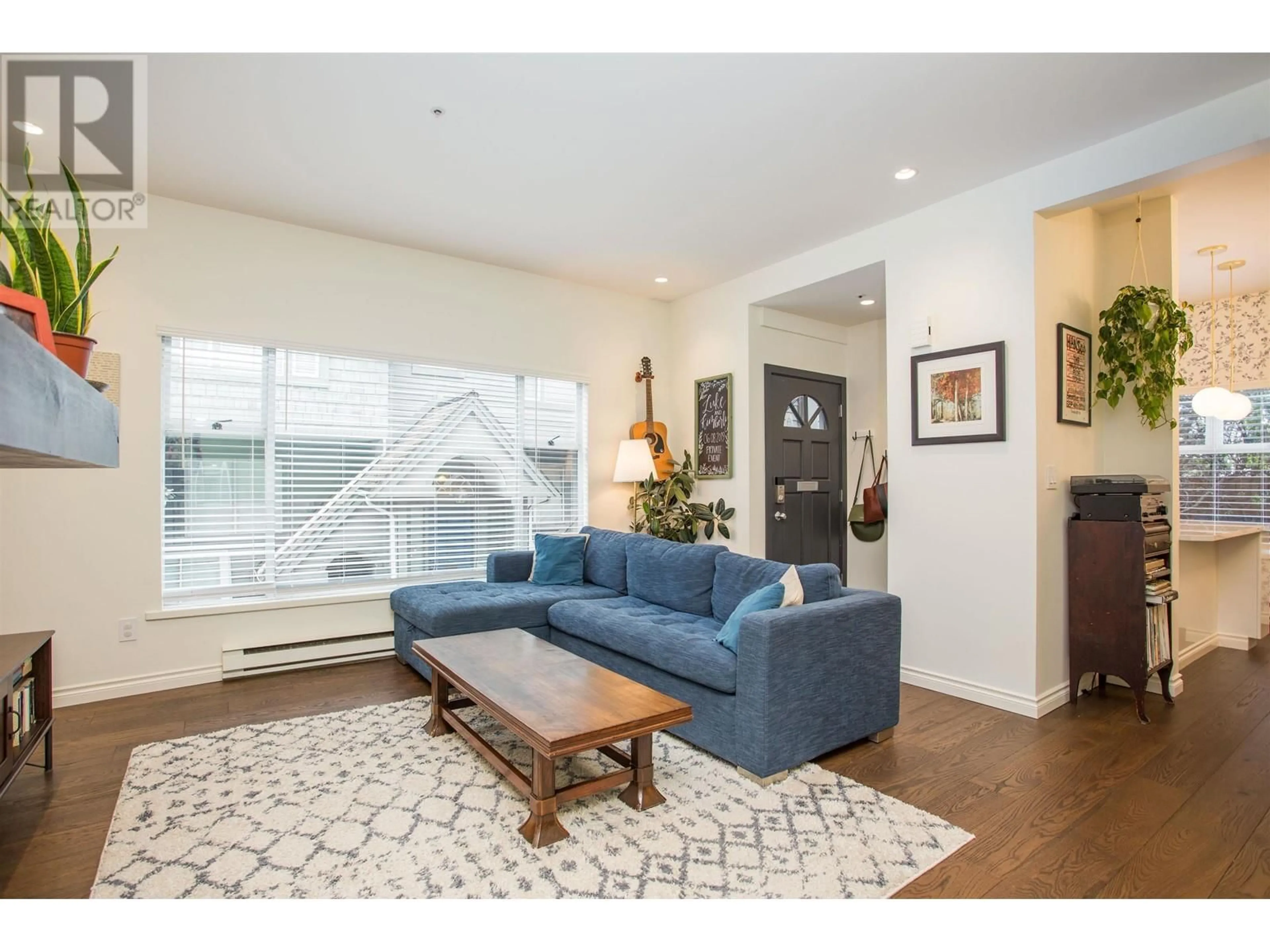 Living room with furniture, wood/laminate floor for 819 7TH AVENUE, Vancouver British Columbia V5Z1C2