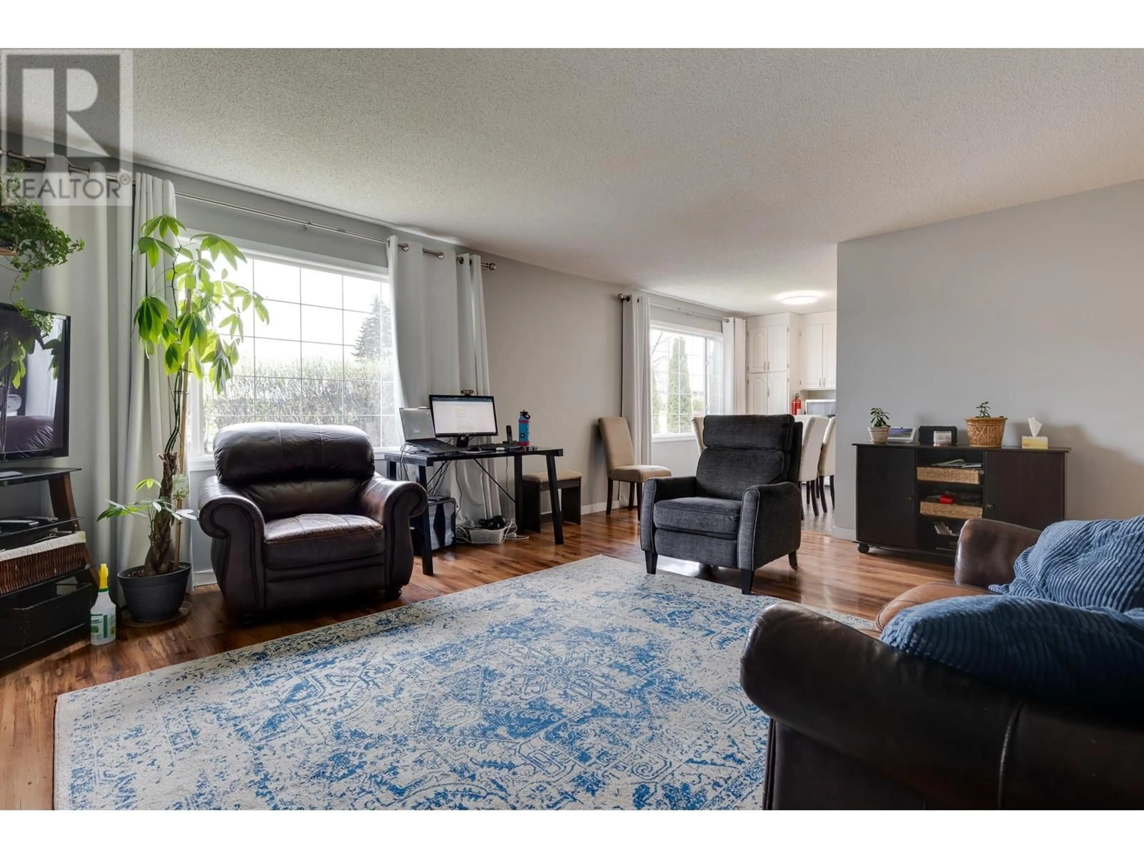 Living room with furniture, wood/laminate floor for 539 PILOT STREET, Prince George British Columbia V2M5H9