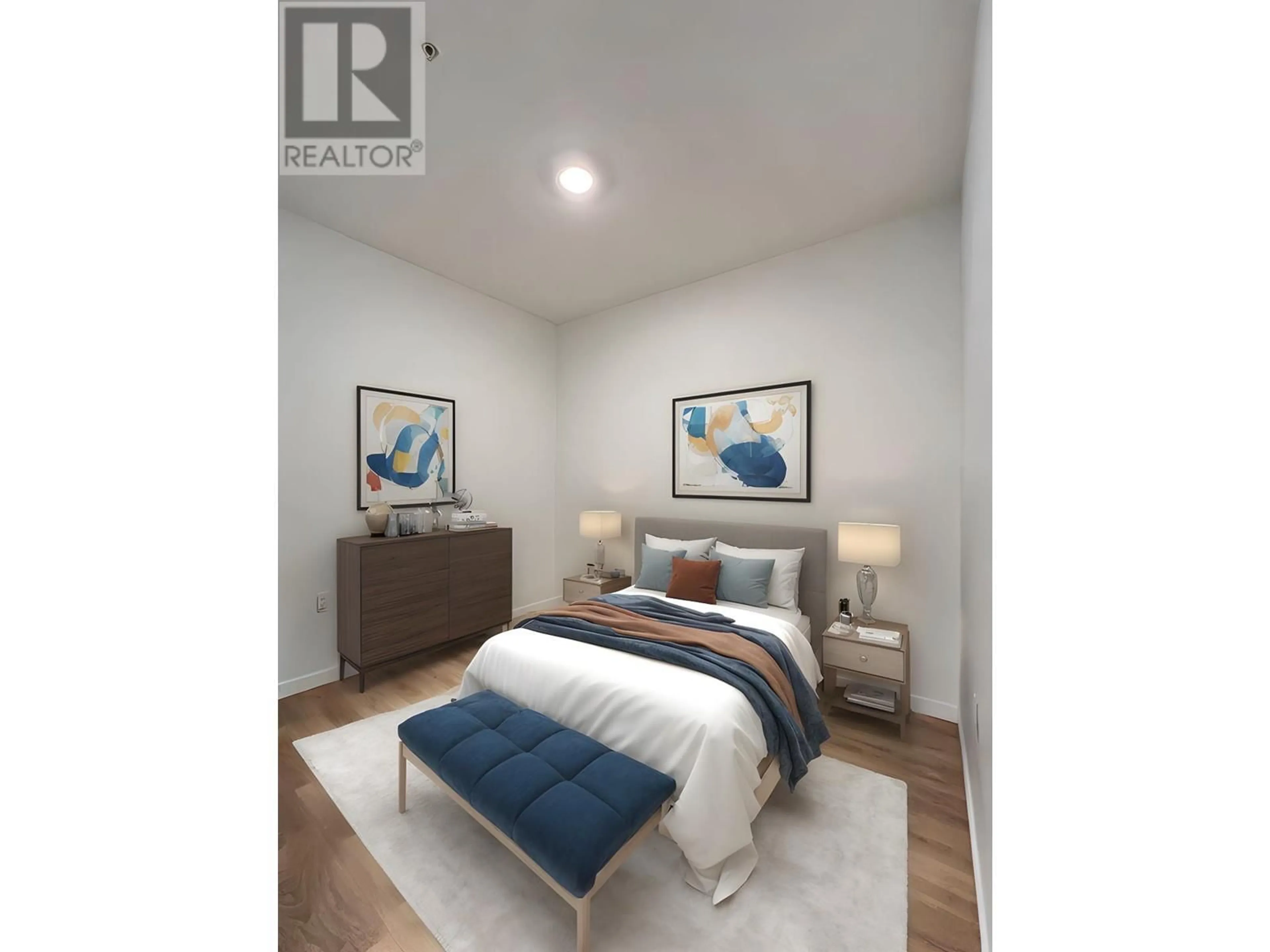 Bedroom with bed, wood/laminate floor for 319 - 725 MARINE DRIVE, North Vancouver British Columbia V7M0G2