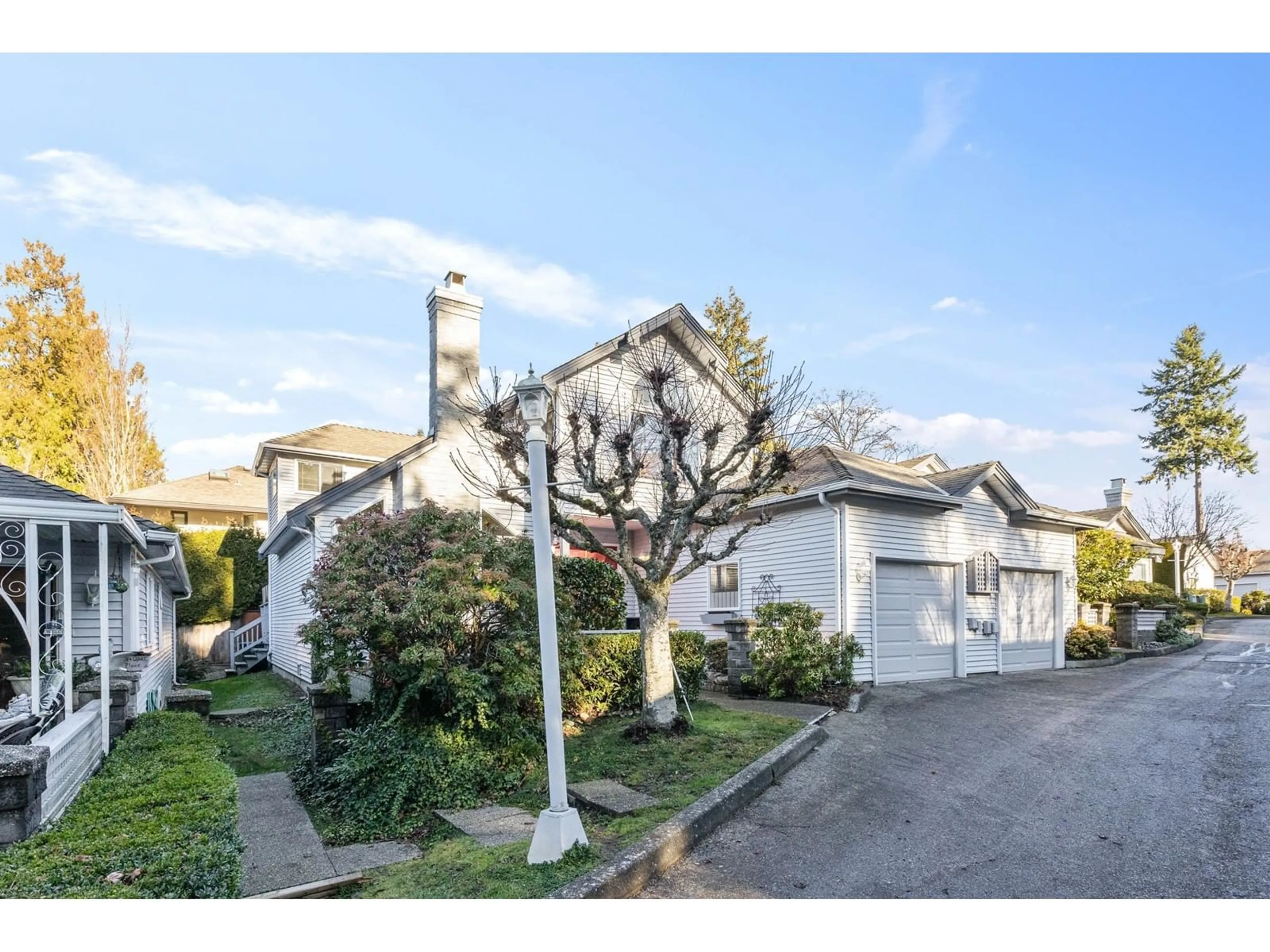 A pic from outside/outdoor area/front of a property/back of a property/a pic from drone, street for 102 - 1744 128, Surrey British Columbia V4A3V4