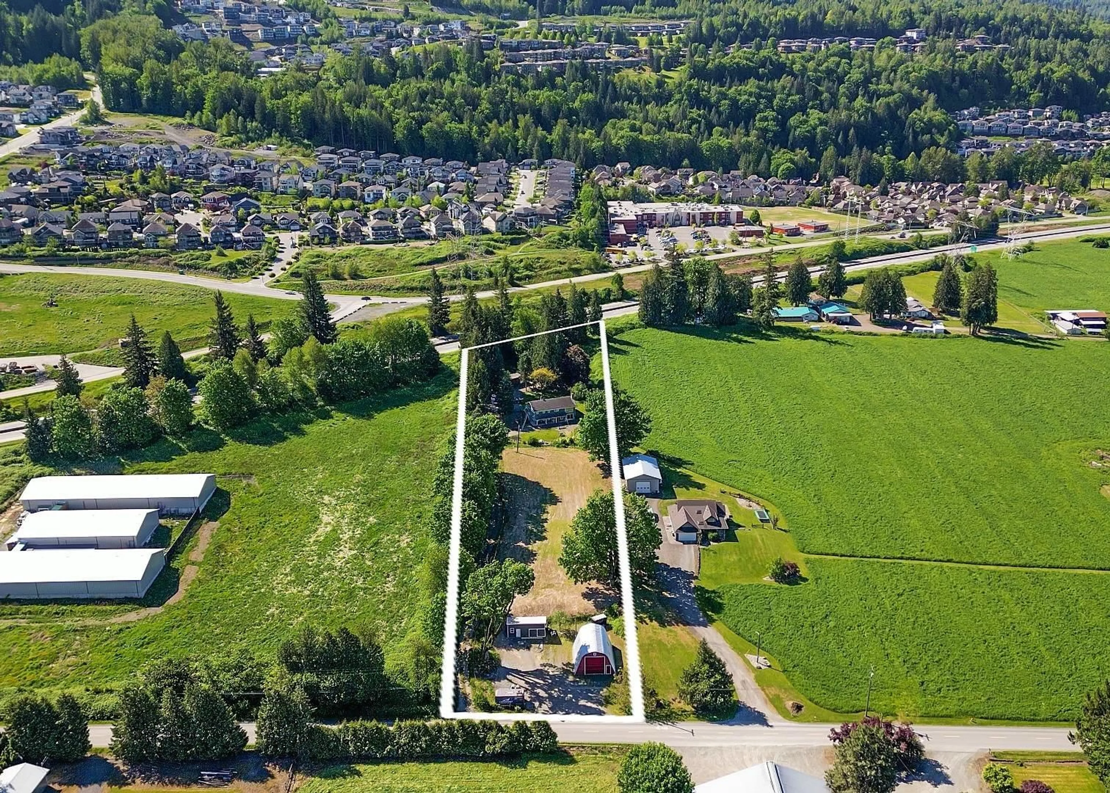 A pic from outside/outdoor area/front of a property/back of a property/a pic from drone, unknown for 51010 CHILLIWACK CENTRAL ROAD, Chilliwack British Columbia V0X1X2