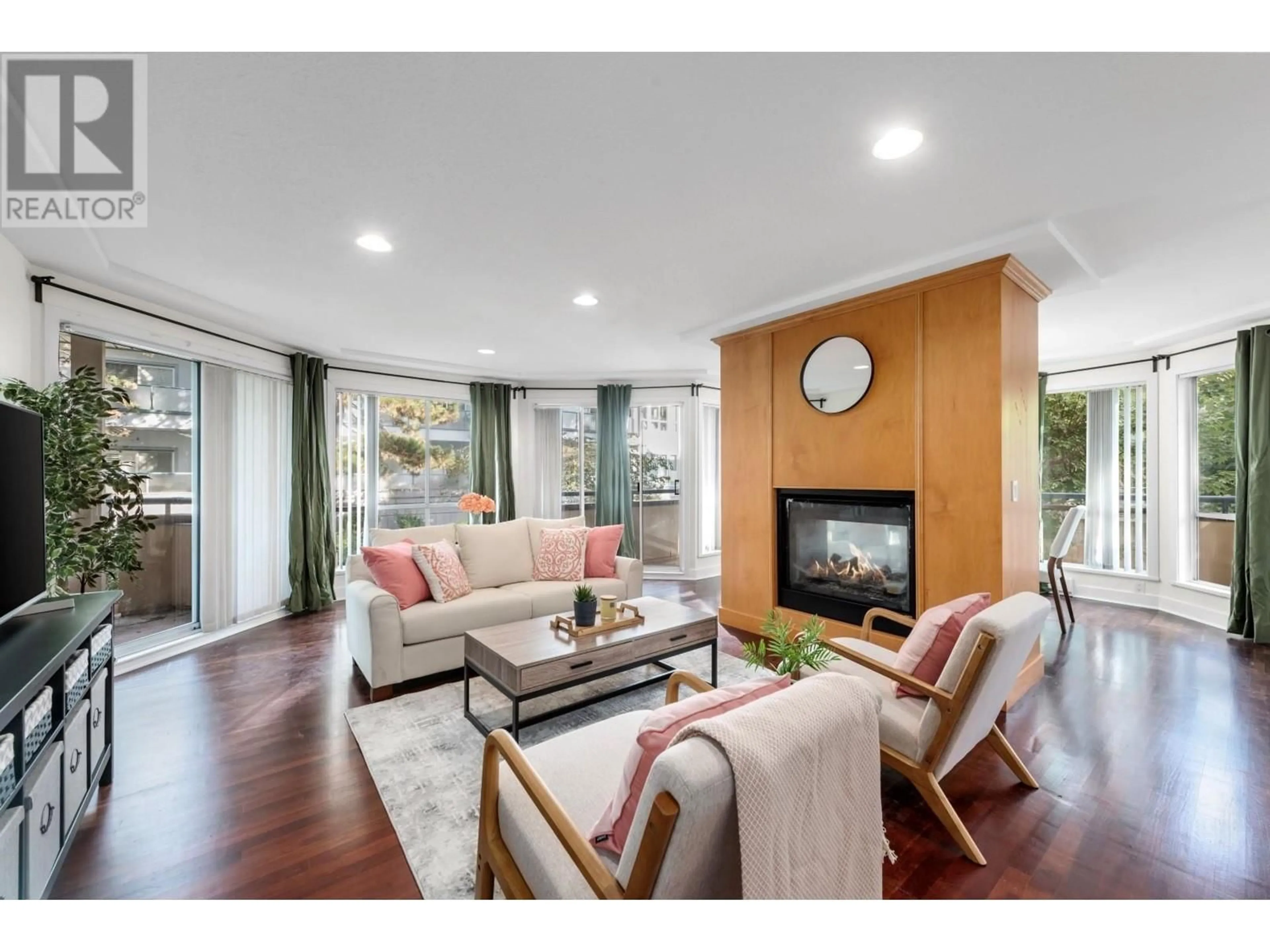 Living room with furniture, wood/laminate floor for 107 - 8600 LANSDOWNE ROAD, Richmond British Columbia V6X3L6