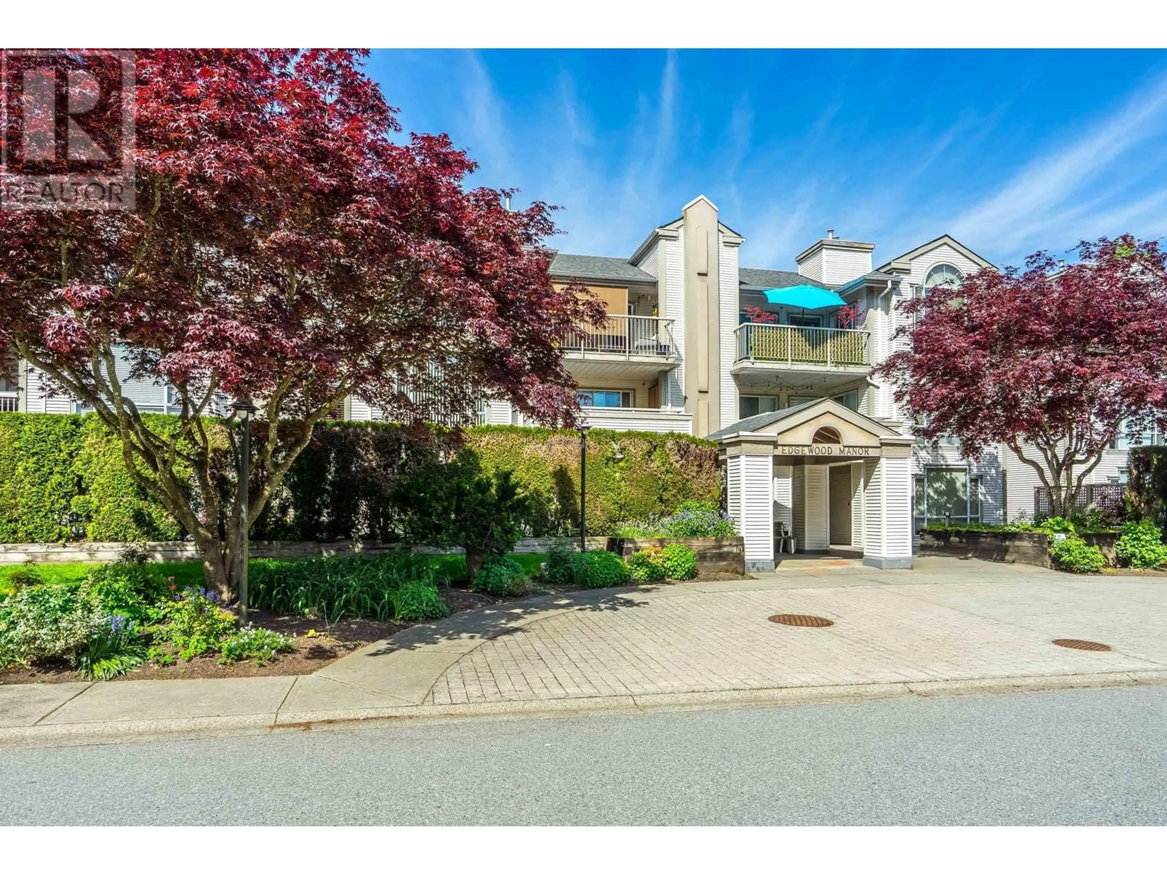 A pic from outside/outdoor area/front of a property/back of a property/a pic from drone, street for 206 - 19122 122 AVENUE, Pitt Meadows British Columbia V3Y2N7