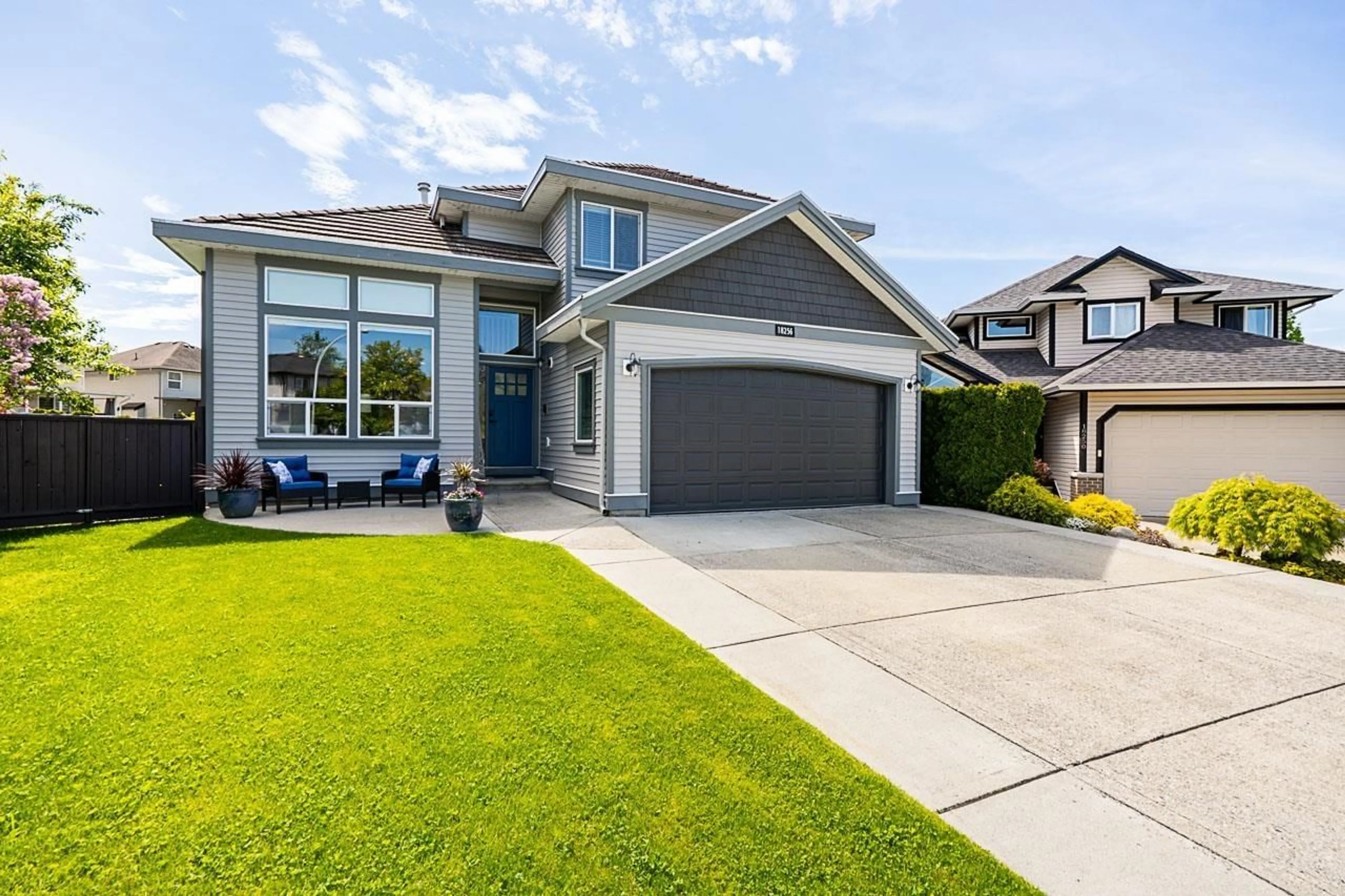 Home with vinyl exterior material, street for 18256 68A, Surrey British Columbia V3S9E4